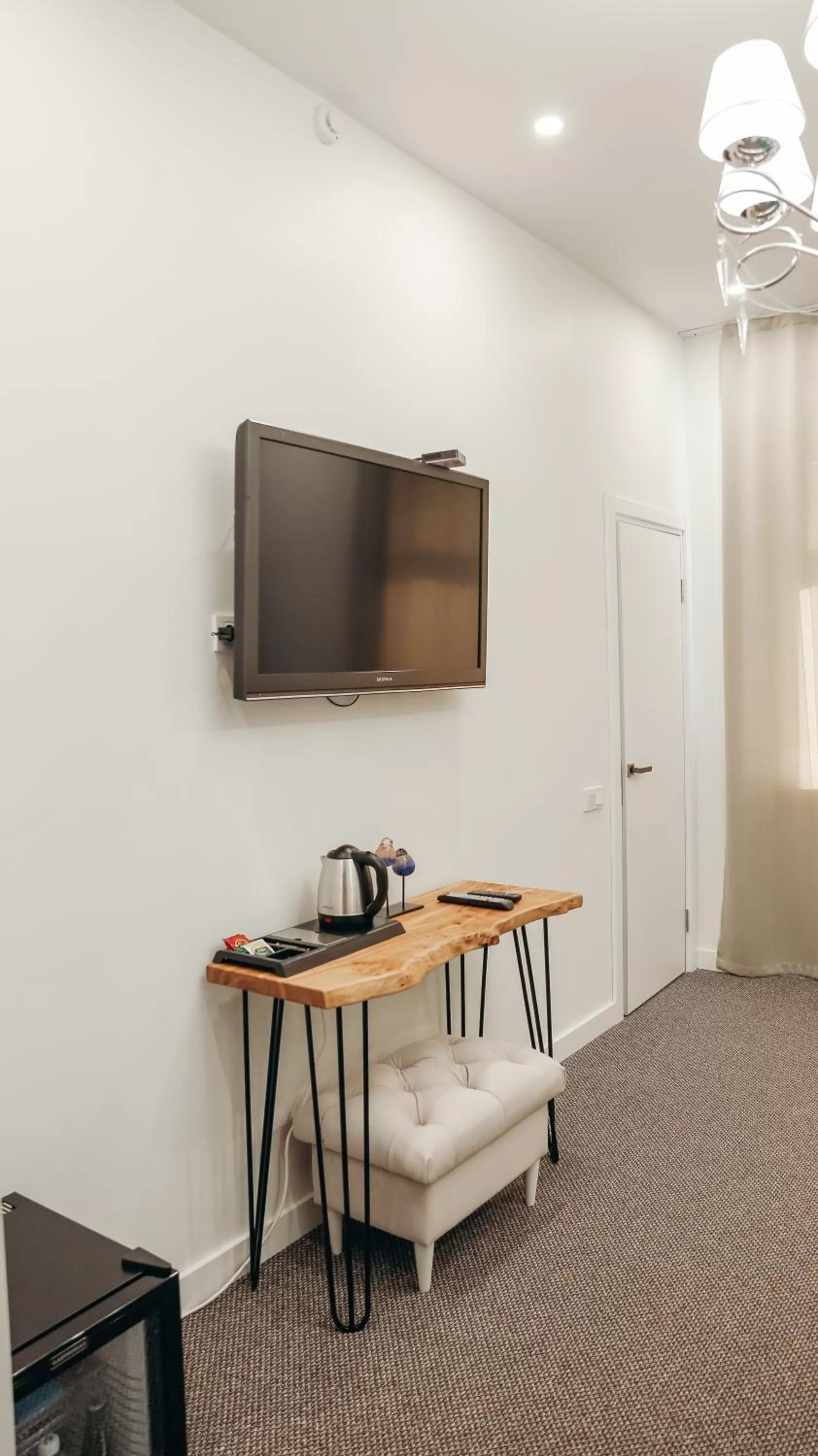 TV and multimedia, TV/Entertainment Center in 7 Boutique Hotel