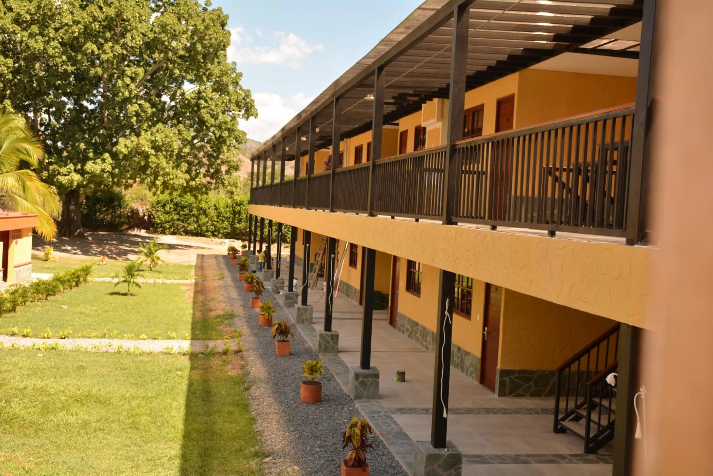 Garden view, Property Building in Hotel Portón del Sol