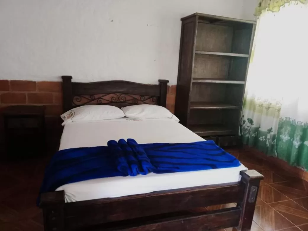 Bed in Finca Hotel Cabañas del parque