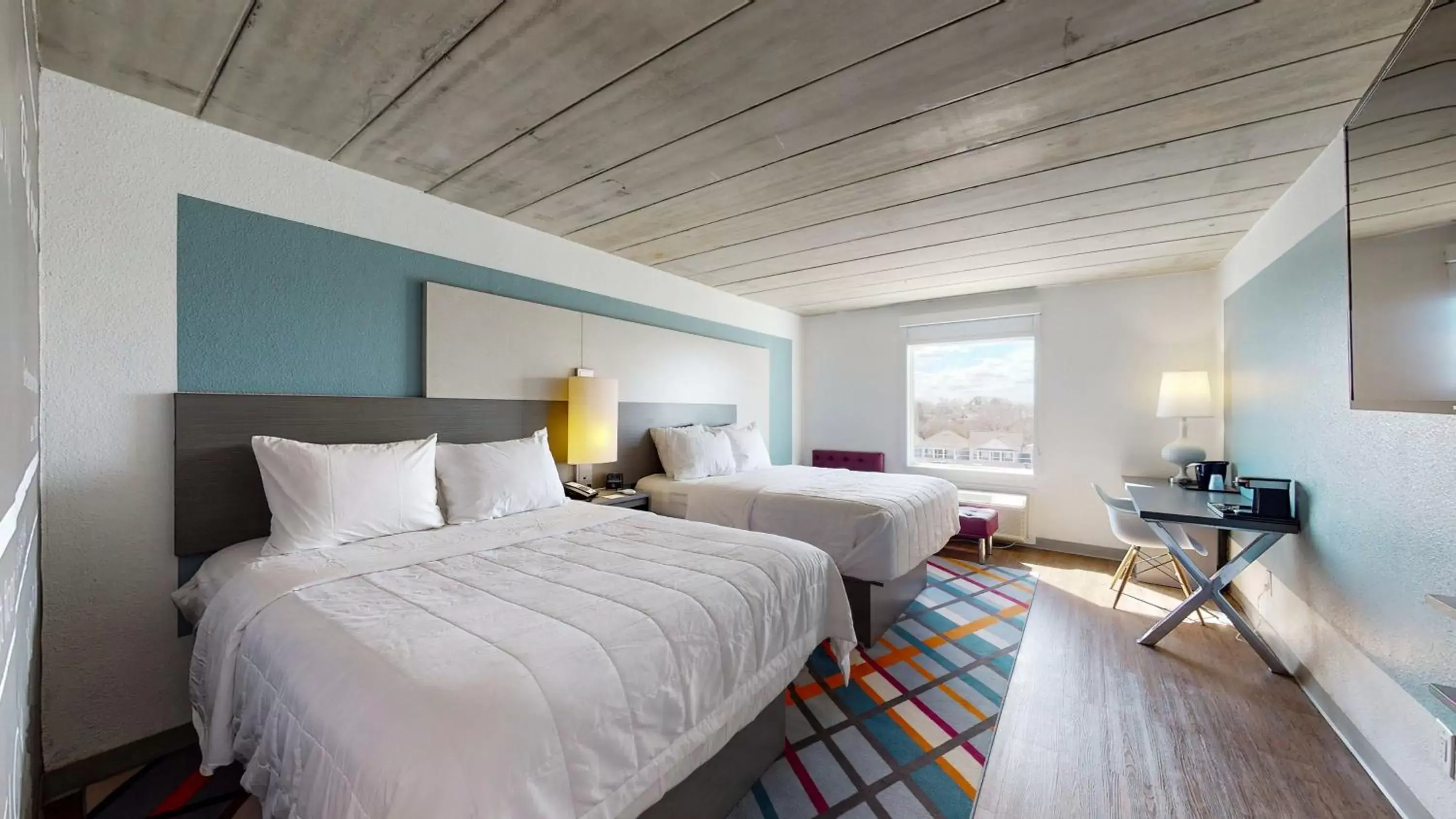 Premium Queen Room with Two Queen Beds and Kyle Field View in Aggieland Boutique Hotel Premium Queen Room with Two Queen Beds and Kyle Field View in Aggieland Boutique Hotel