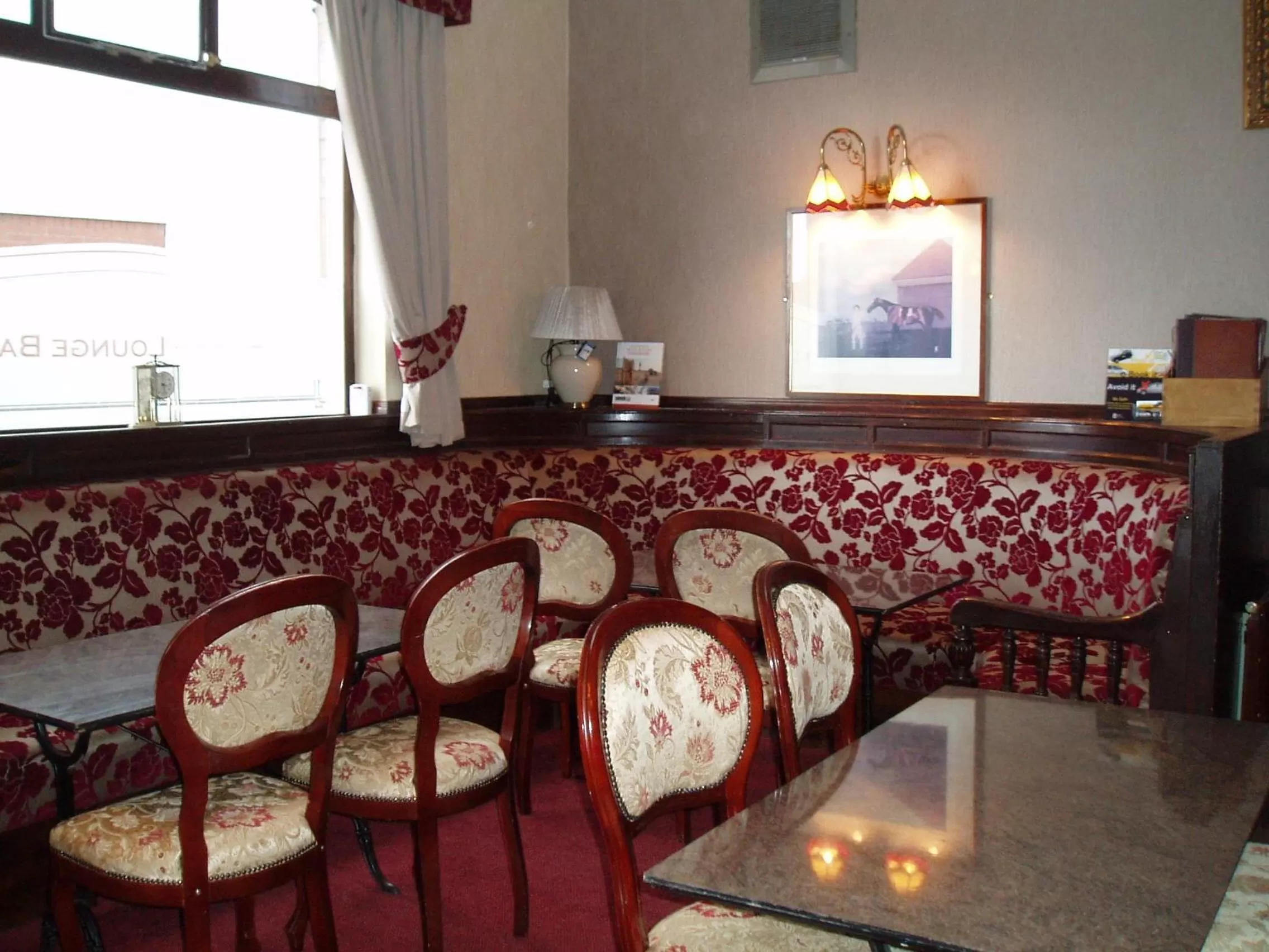 Communal lounge/ TV room in The Whittington and Cat