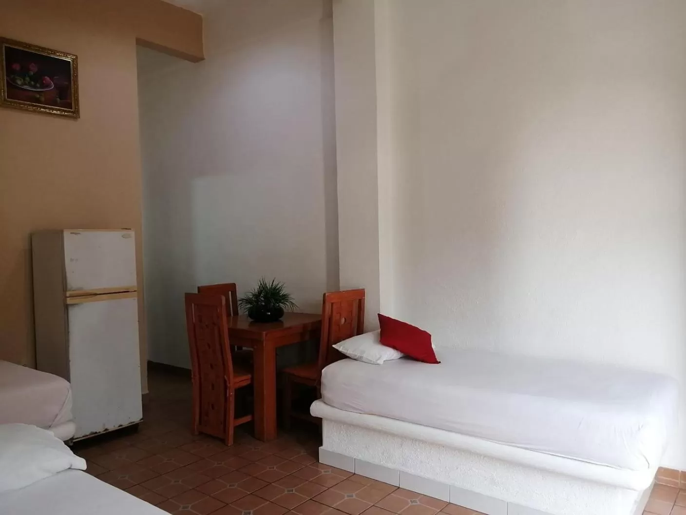 Bed, Seating Area in Hotel Isis