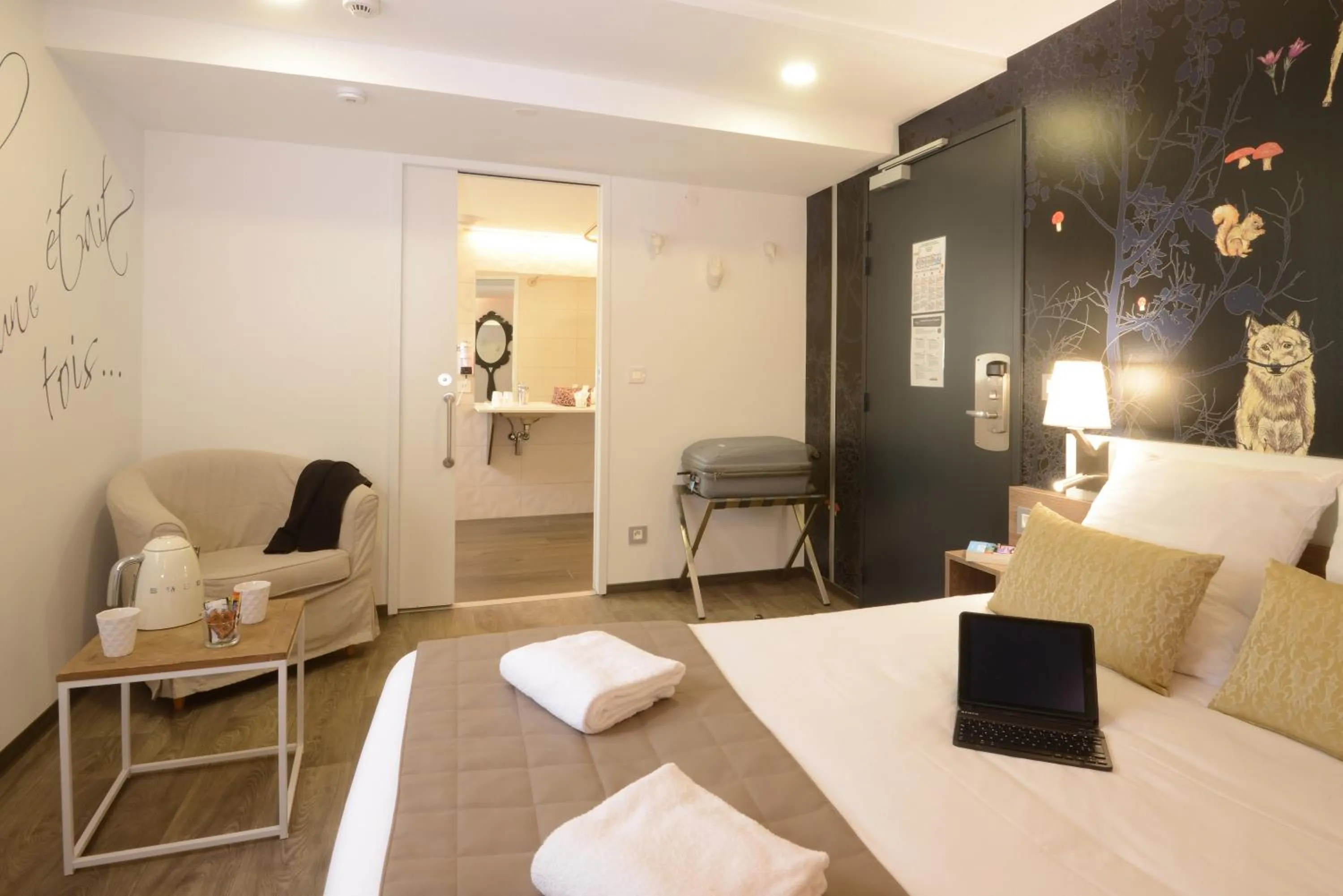 View (from property/room), Bed in Hotel Arc-En-Ciel Colmar Contact Hotel