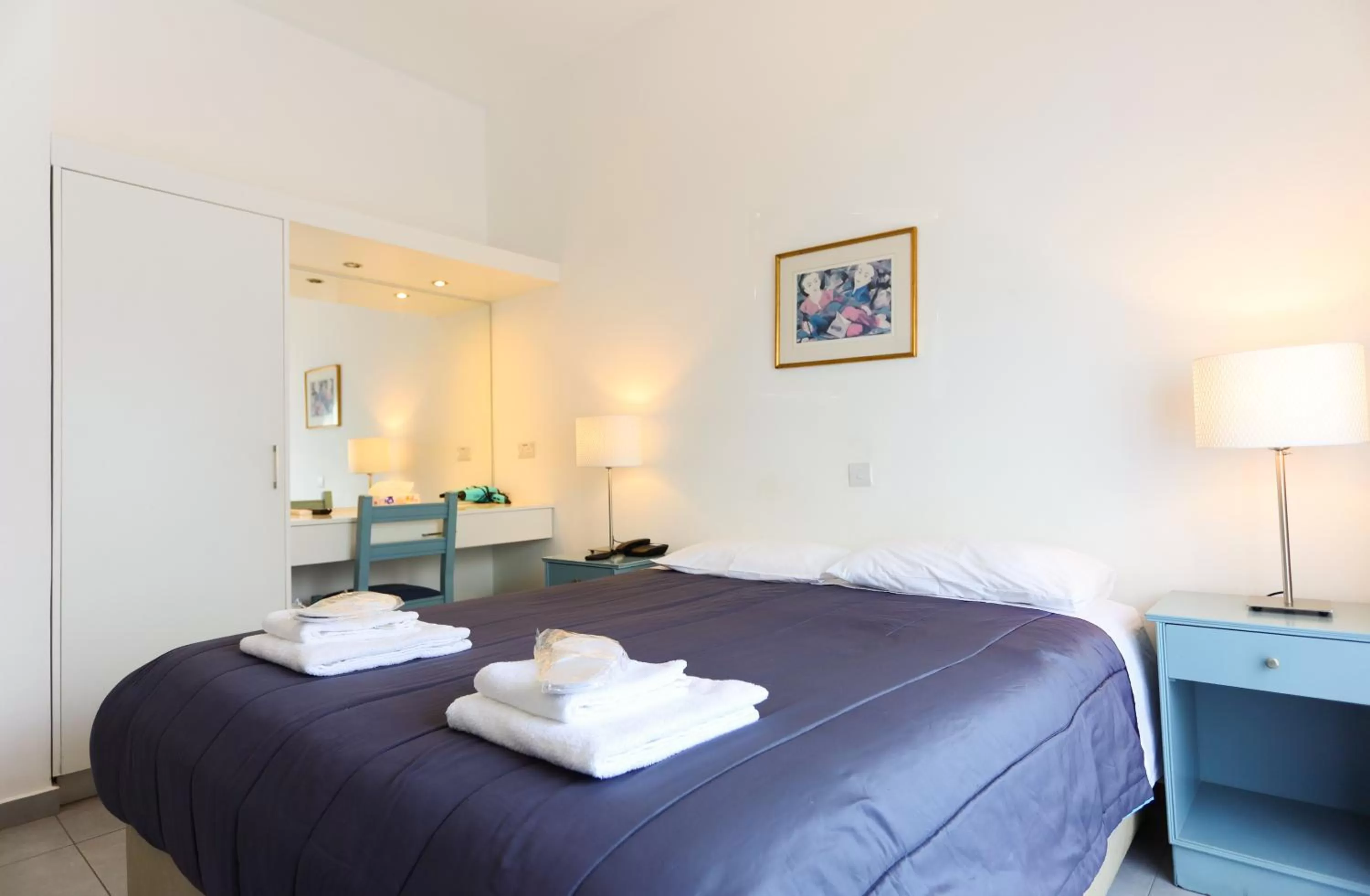 Bed in Axiothea Hotel