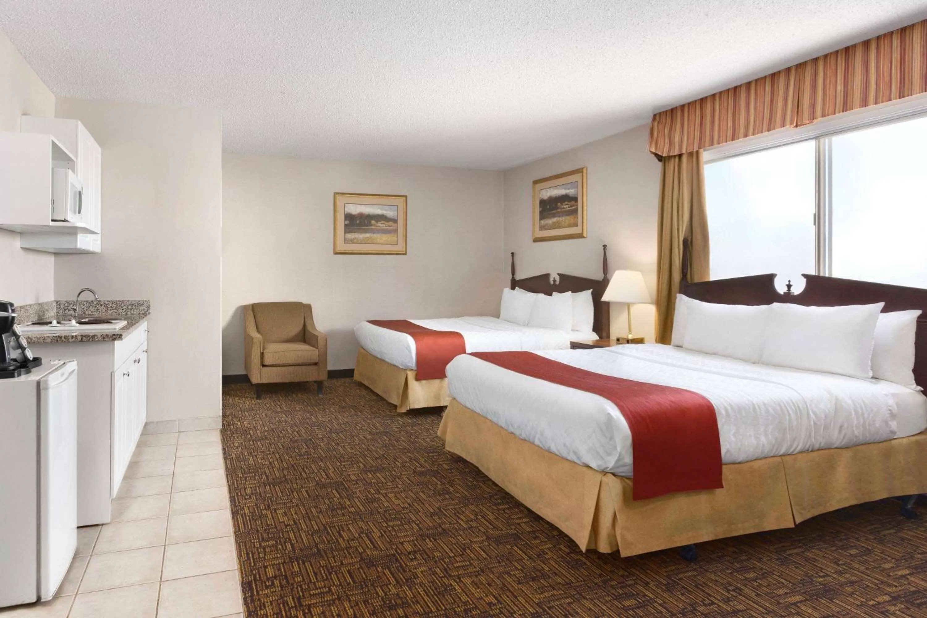 Photo of the whole room, Bed in Travelodge by Wyndham North Battleford