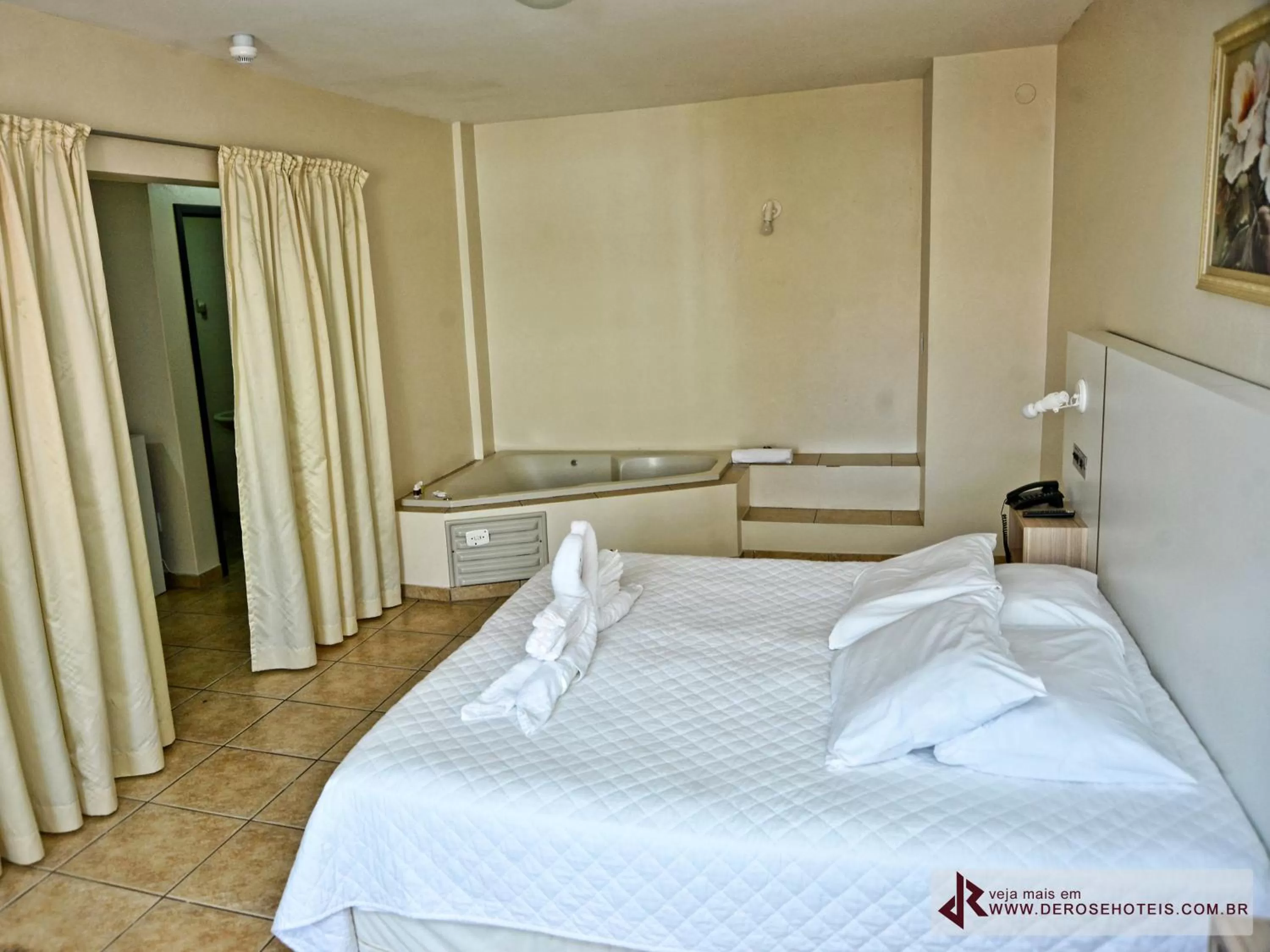 Bed in De Rose Palace Hotel