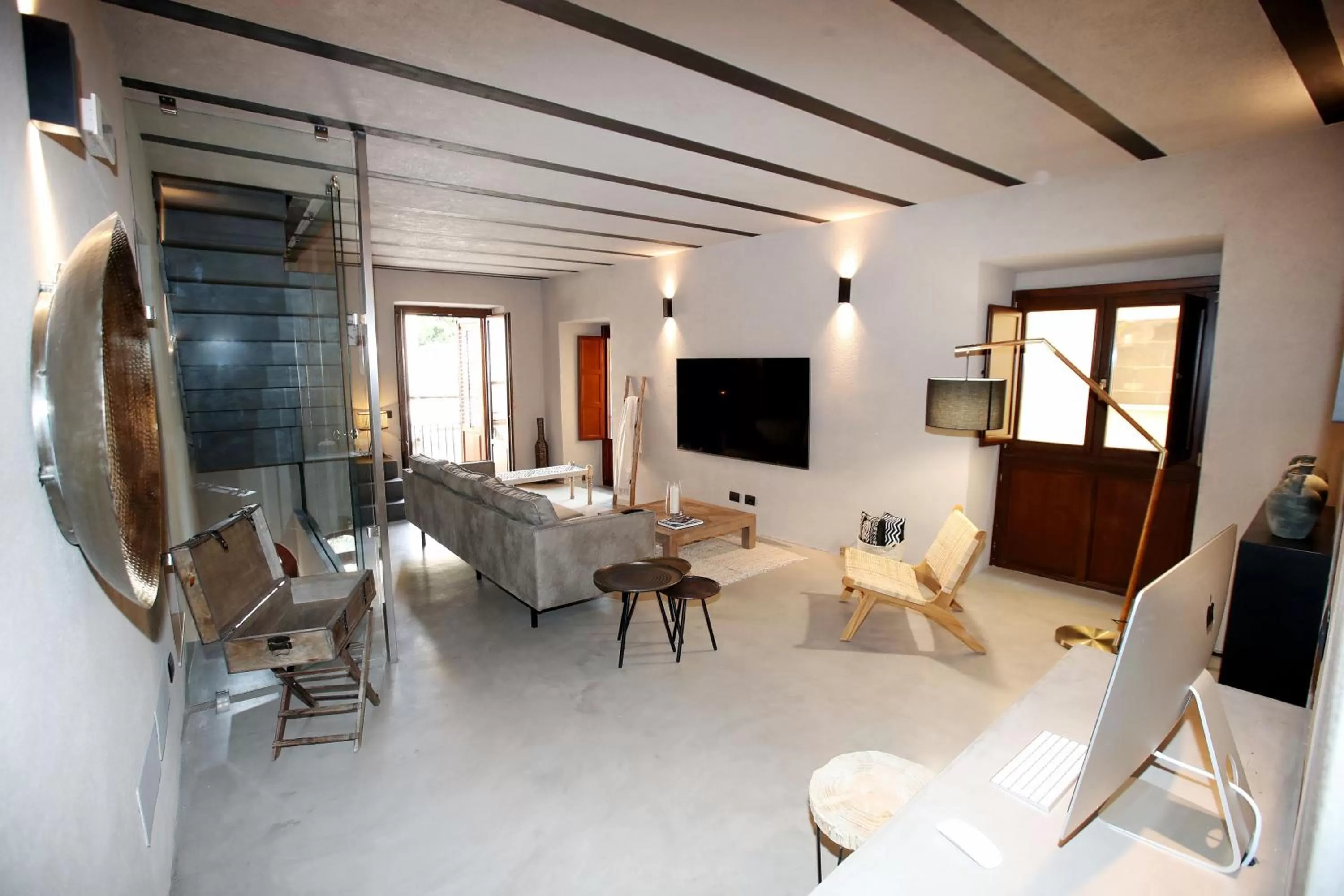 Communal lounge/ TV room in Casa Nostra Luxury Suites & Spa