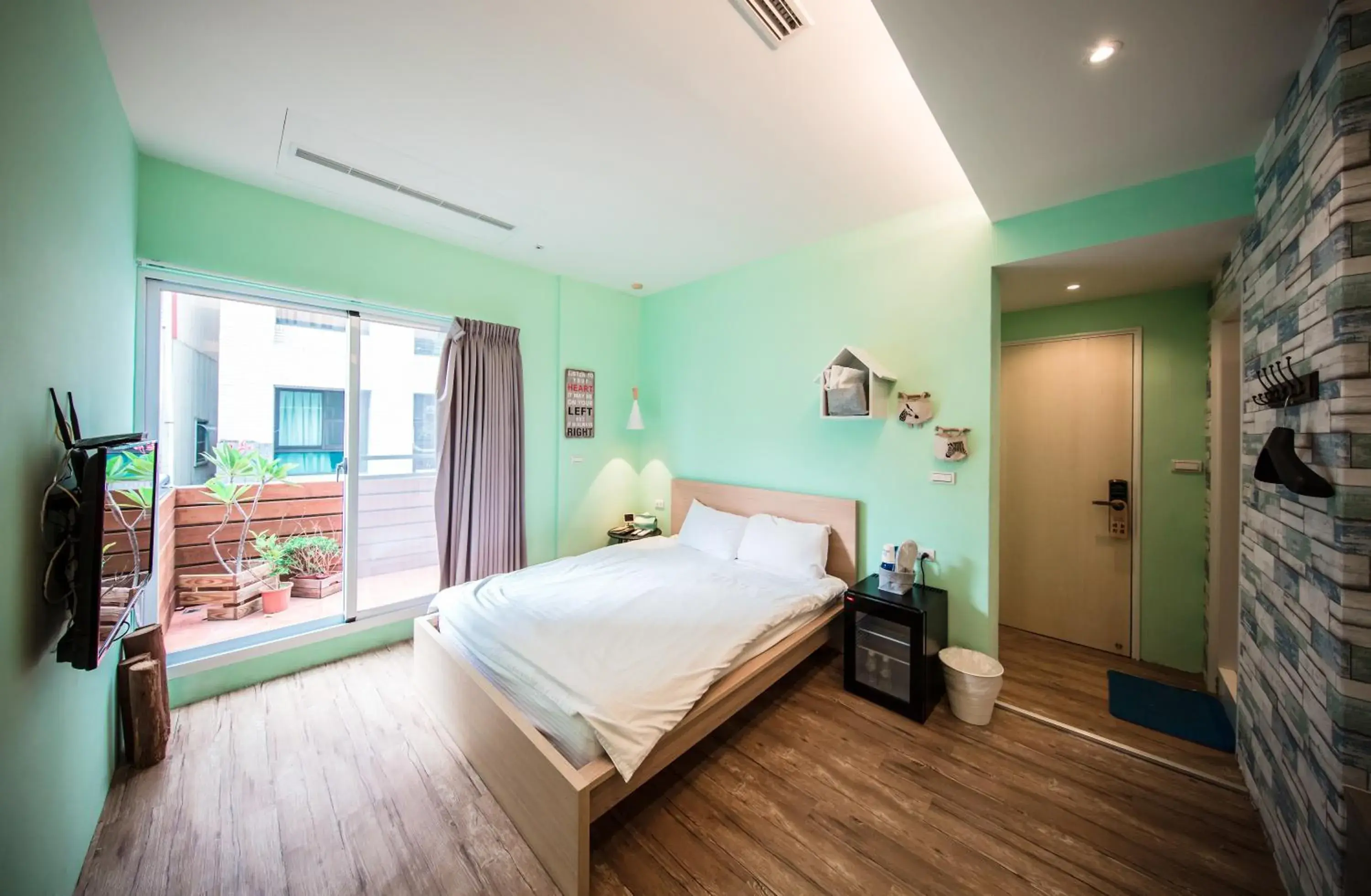 Double Room with Balcony (2 Adults + 1 Child) in Urban Double Room with Balcony (2 Adults + 1 Child) in Urban