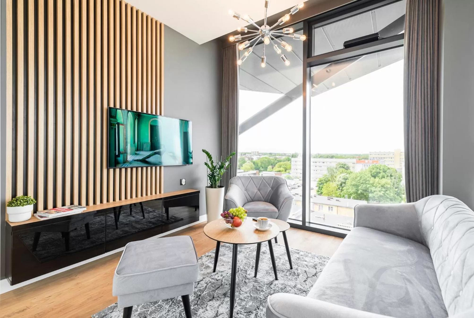 Communal lounge/ TV room in Q18 ApartHotel