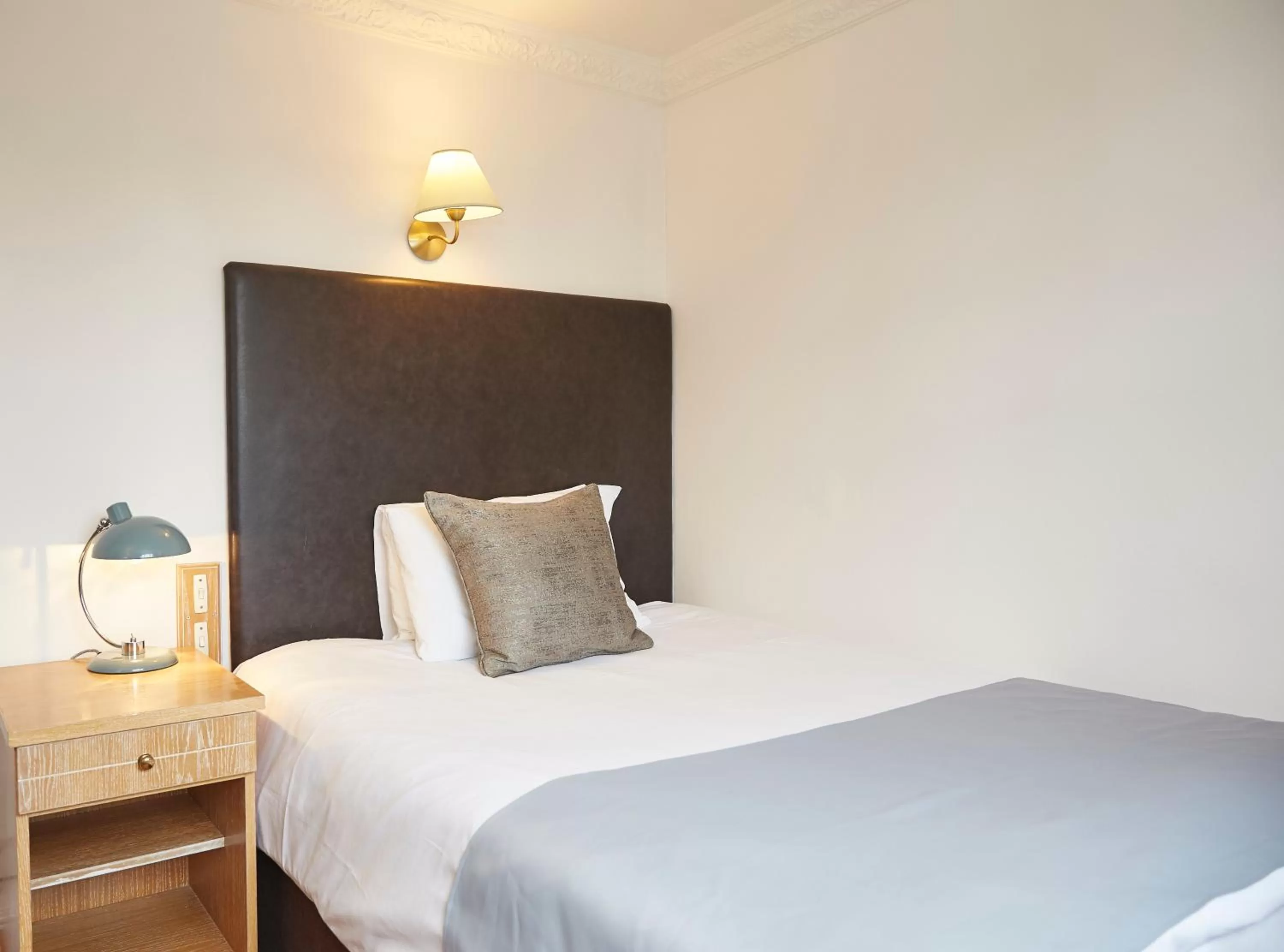 Bed in White Hart Hotel by Greene King Inns