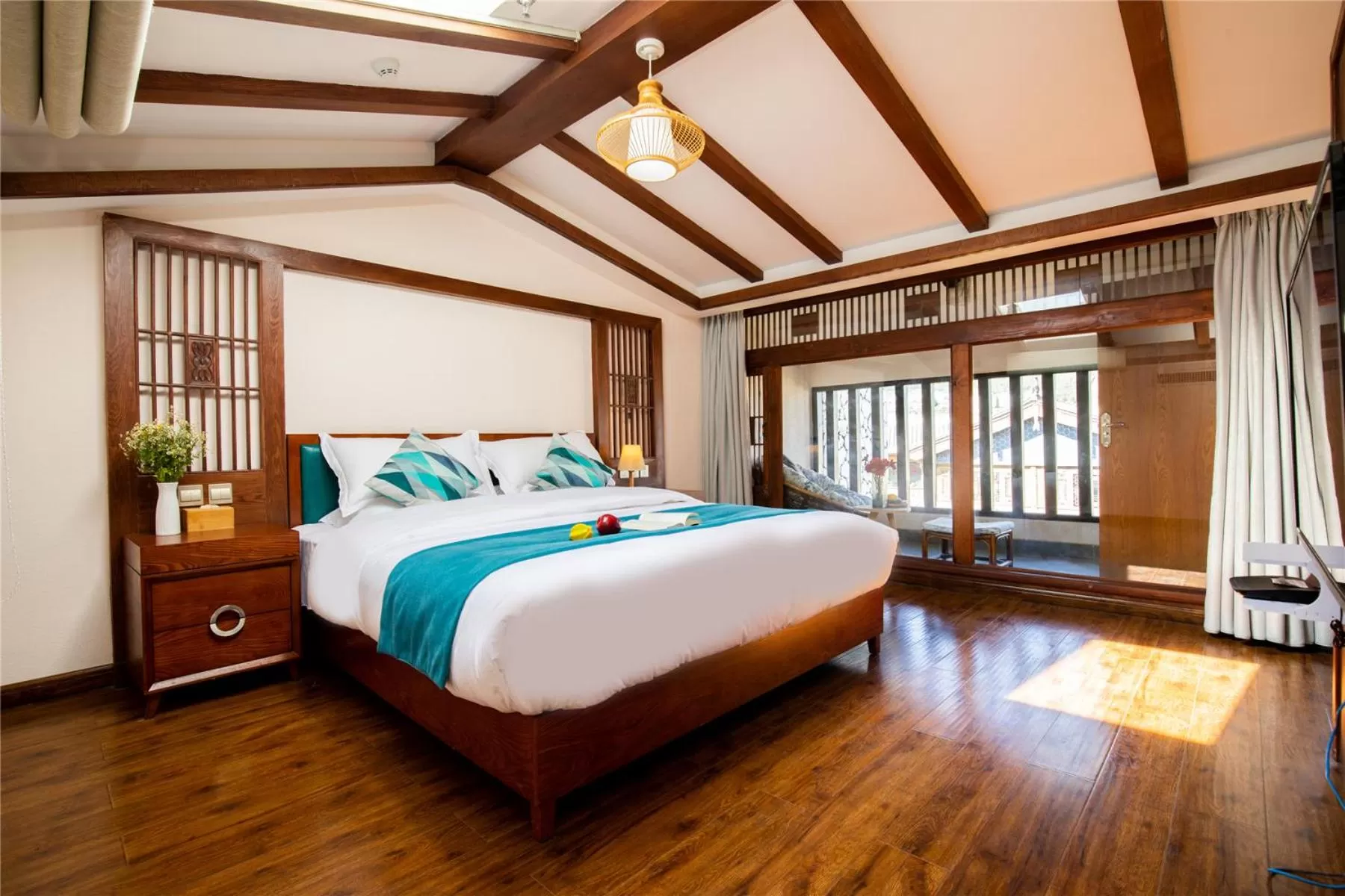 Bed in Lijiang Gemmer Hotel