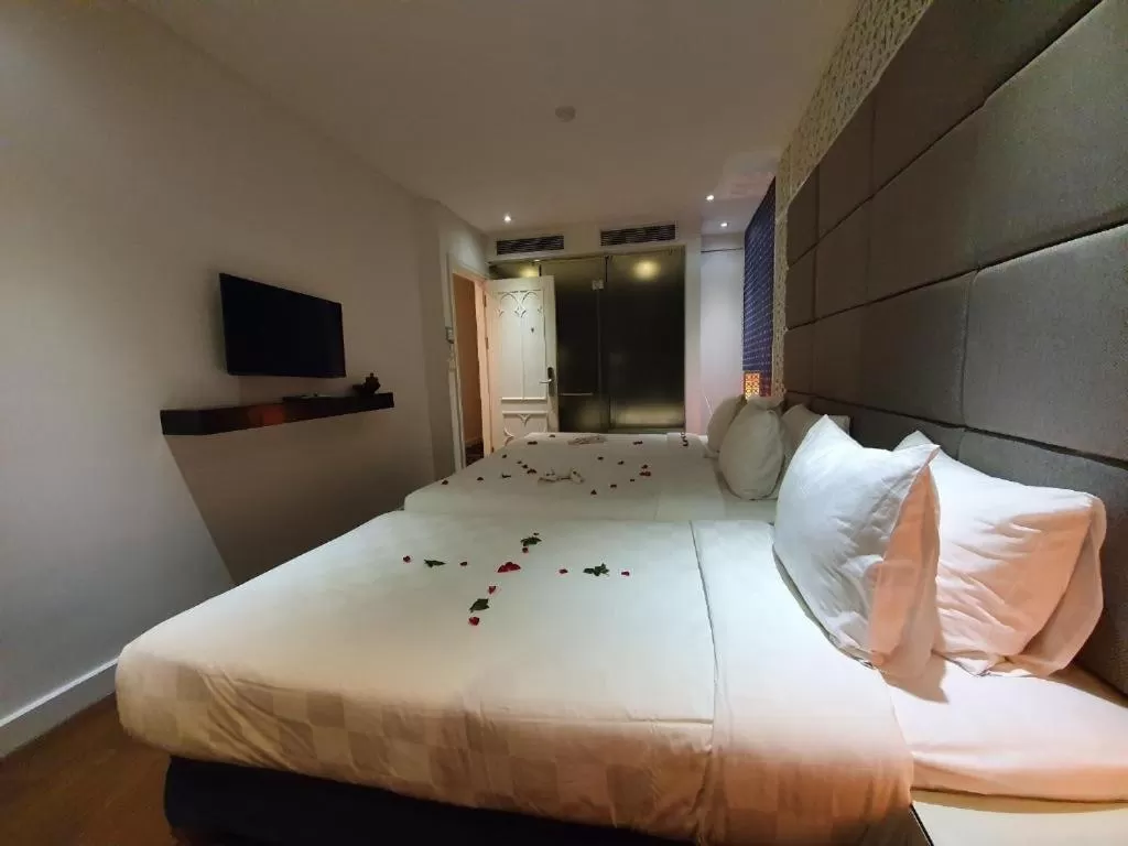 Bed in Victor Metropolis Hanoi Hotel & Rooftop Bar