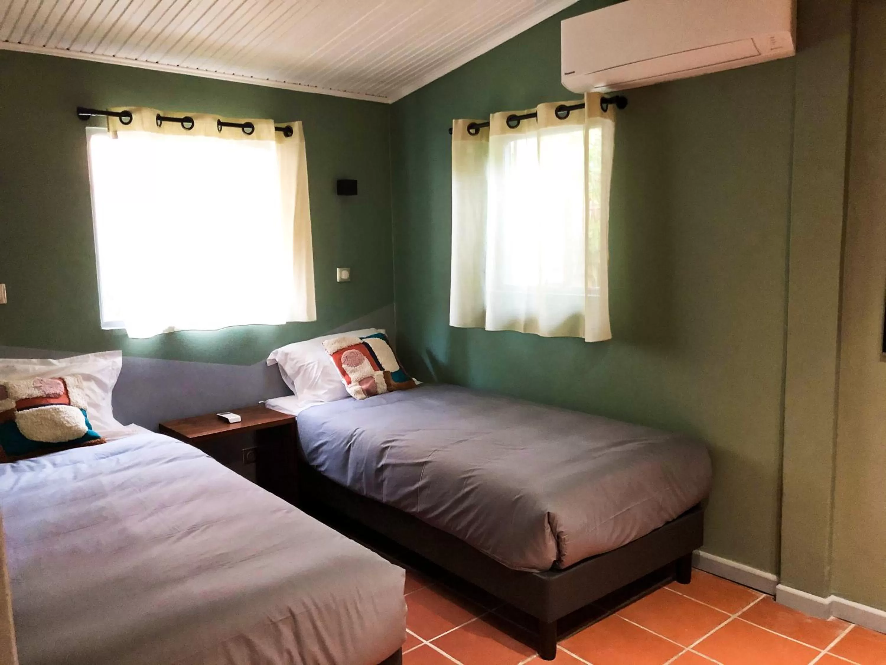 Bed in Eclipse Belle Etoile Appart'hôtel