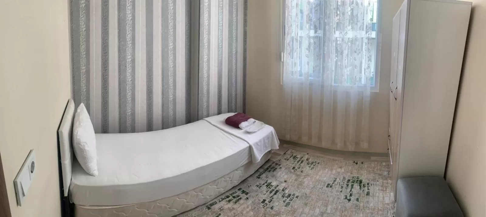 Bed in Mina Suit Apart