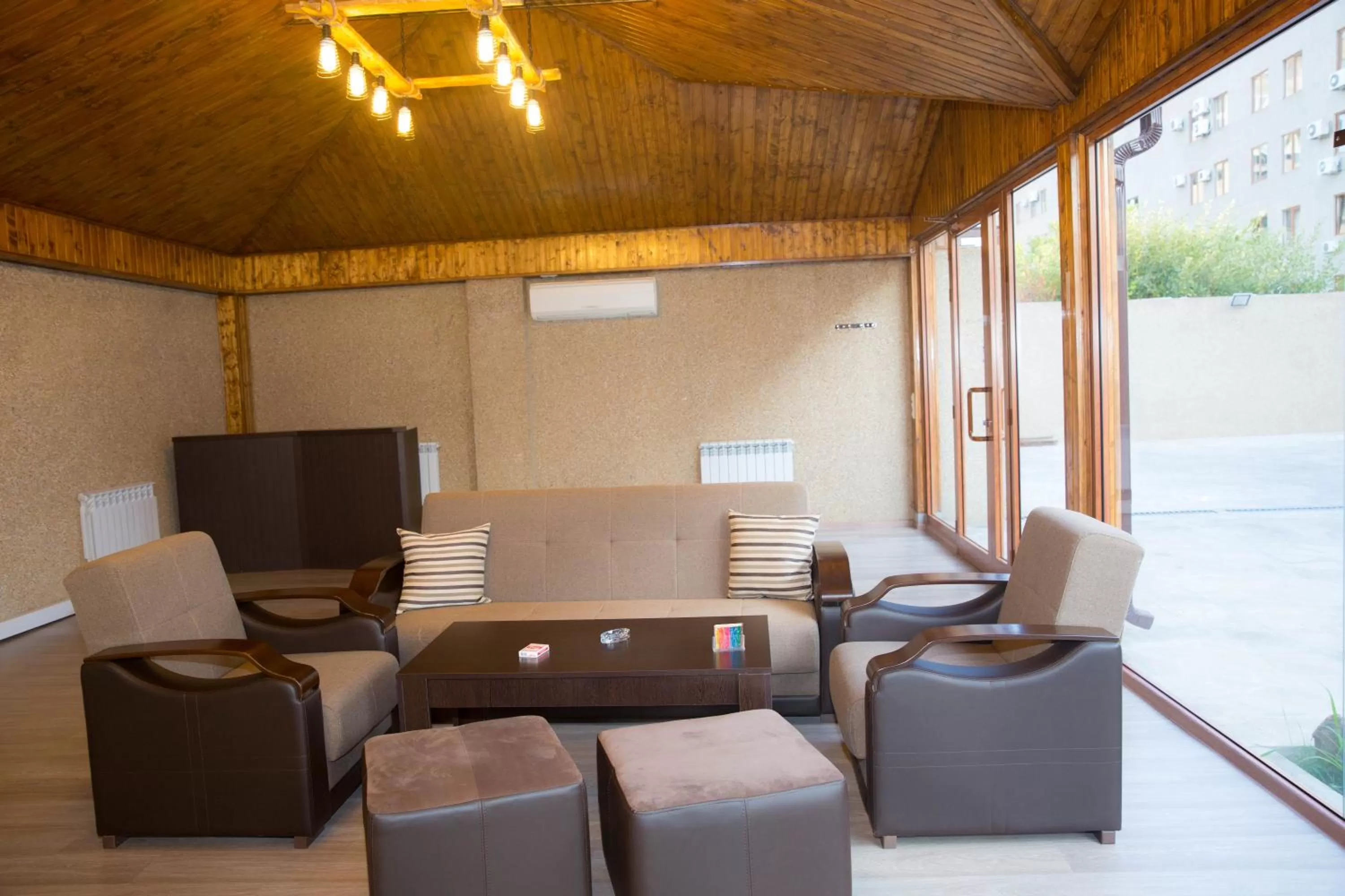 Communal lounge/ TV room, Lounge/Bar in Eridana Hotel