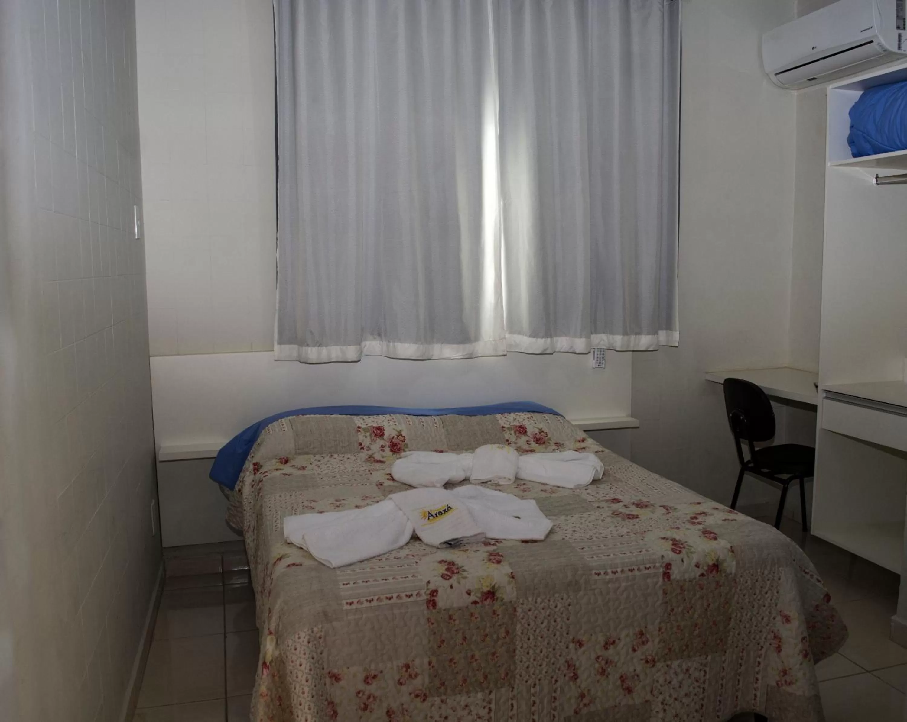 Bed in Pousada Araxá