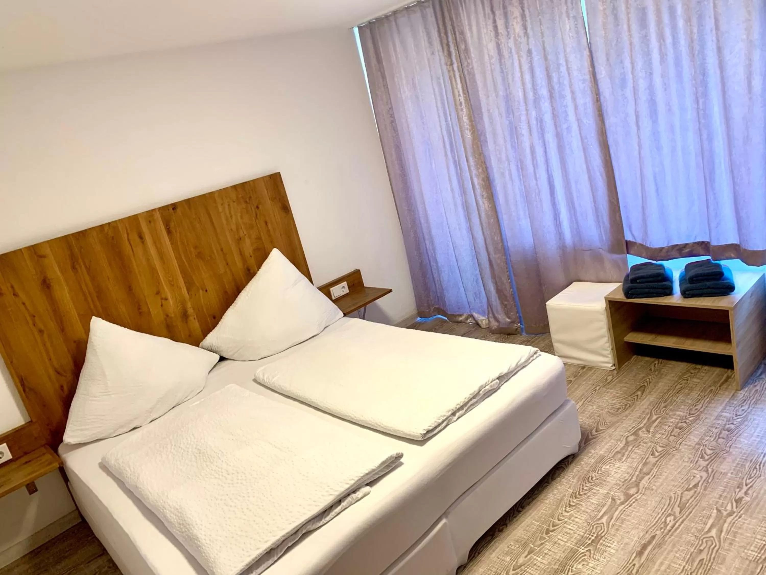 Bed in Smart Stay Rooms Feldkirch