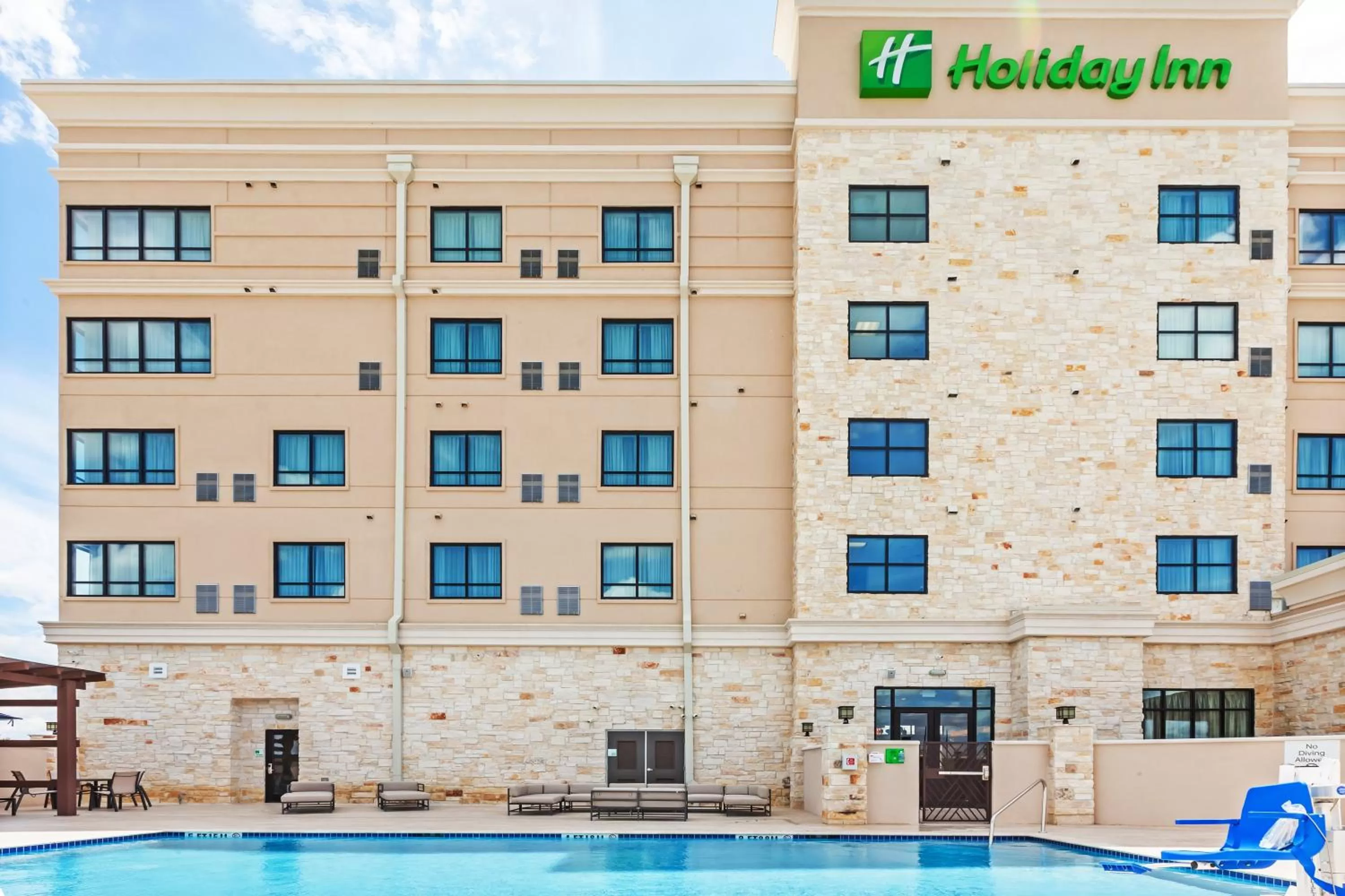 Swimming pool in Holiday Inn Houston NE-Bush Airport Area by IHG