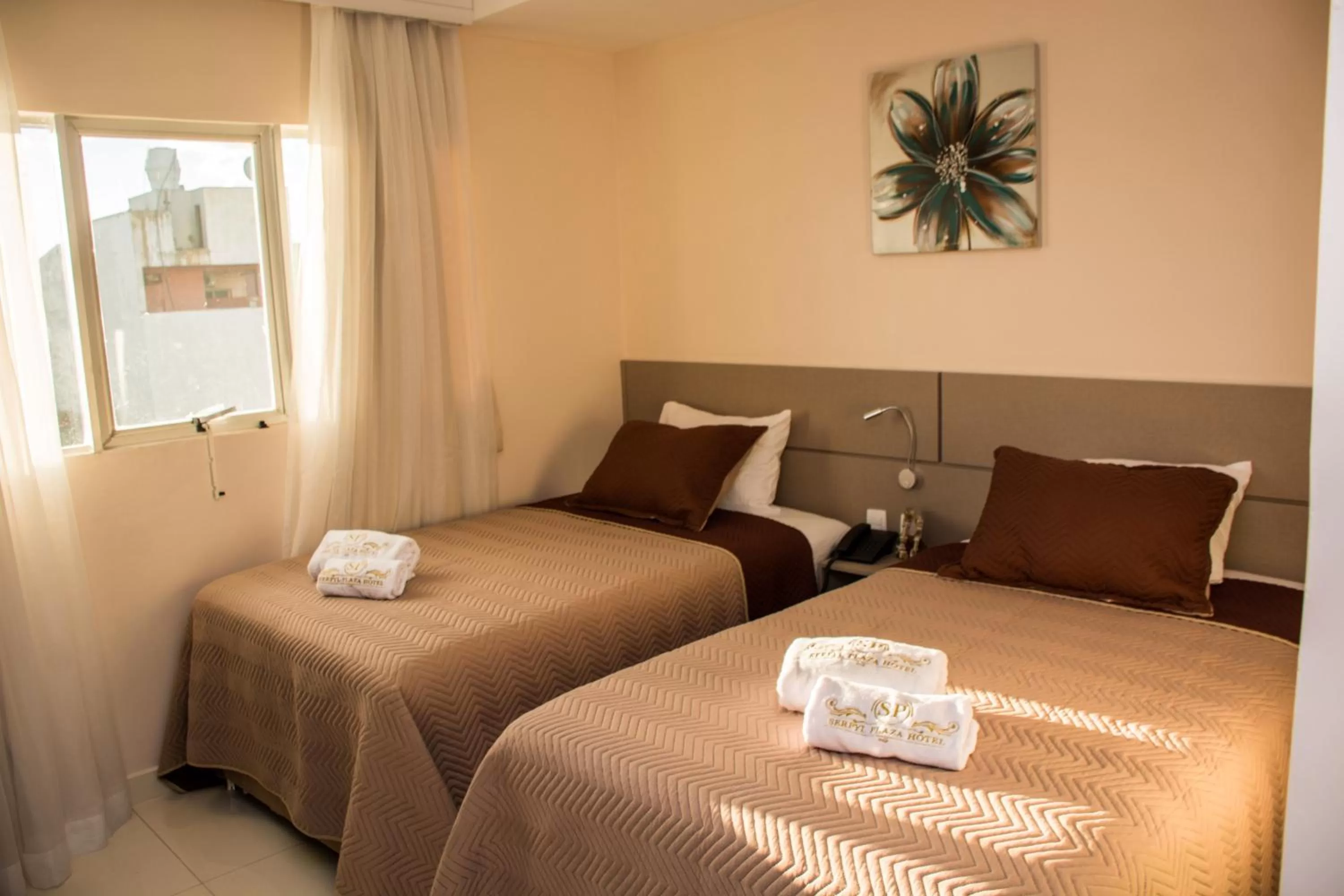 Bed in SERPYL Plaza Hotel