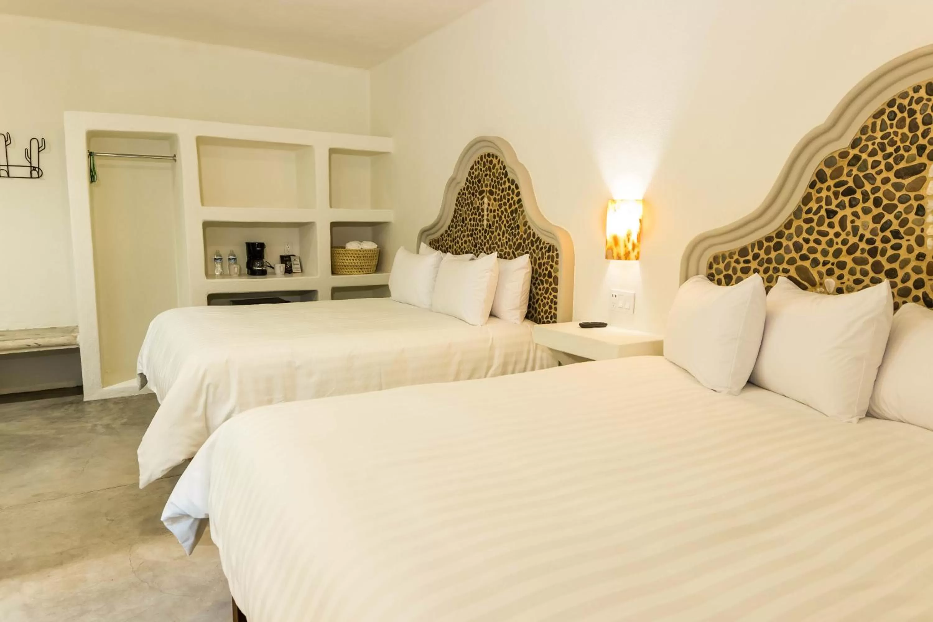 Bed in Paraiso Azul Hotel