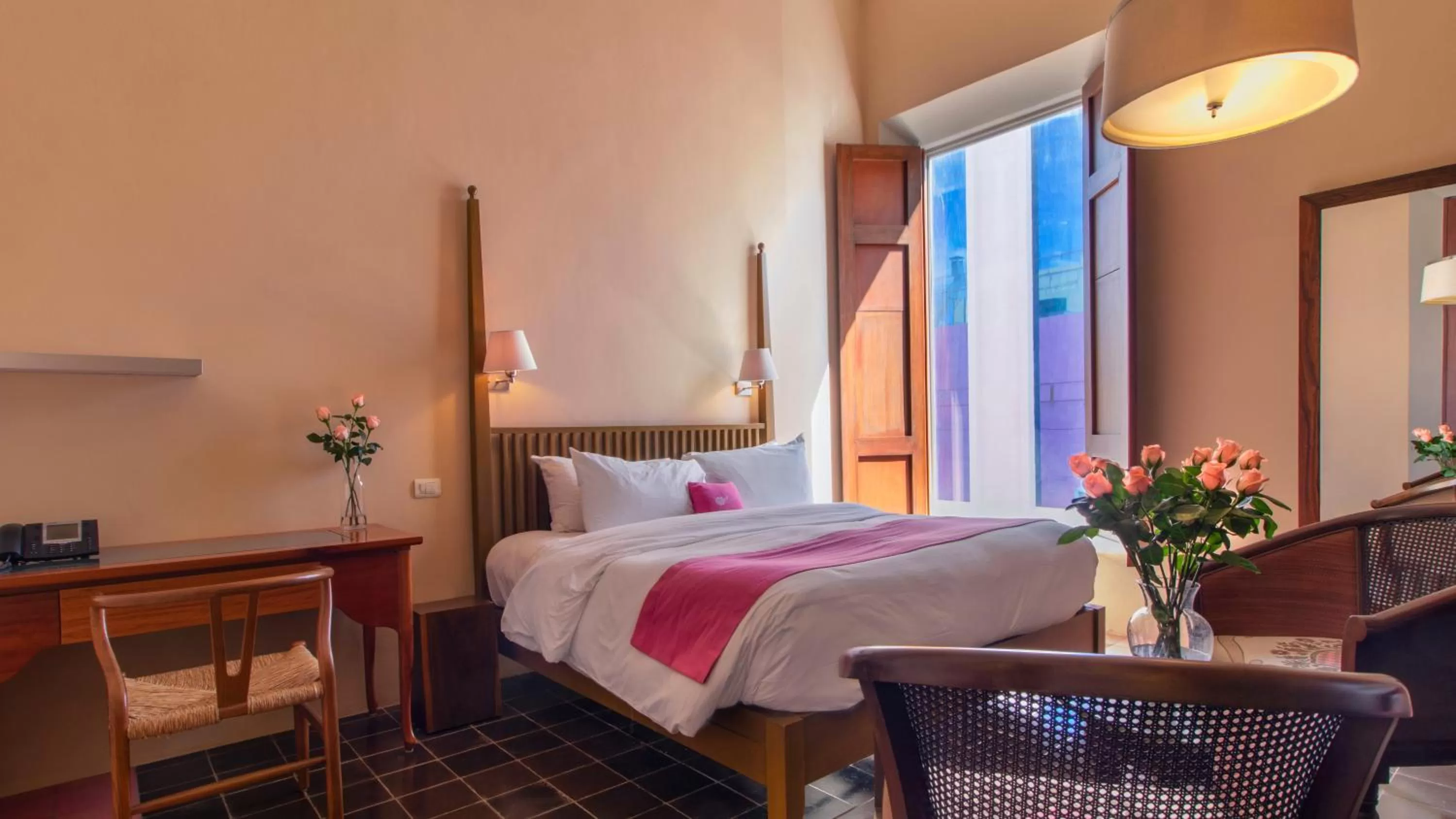 Bed in Rosas & Xocolate Boutique Hotel and Spa Merida, a Member of Design Hotels