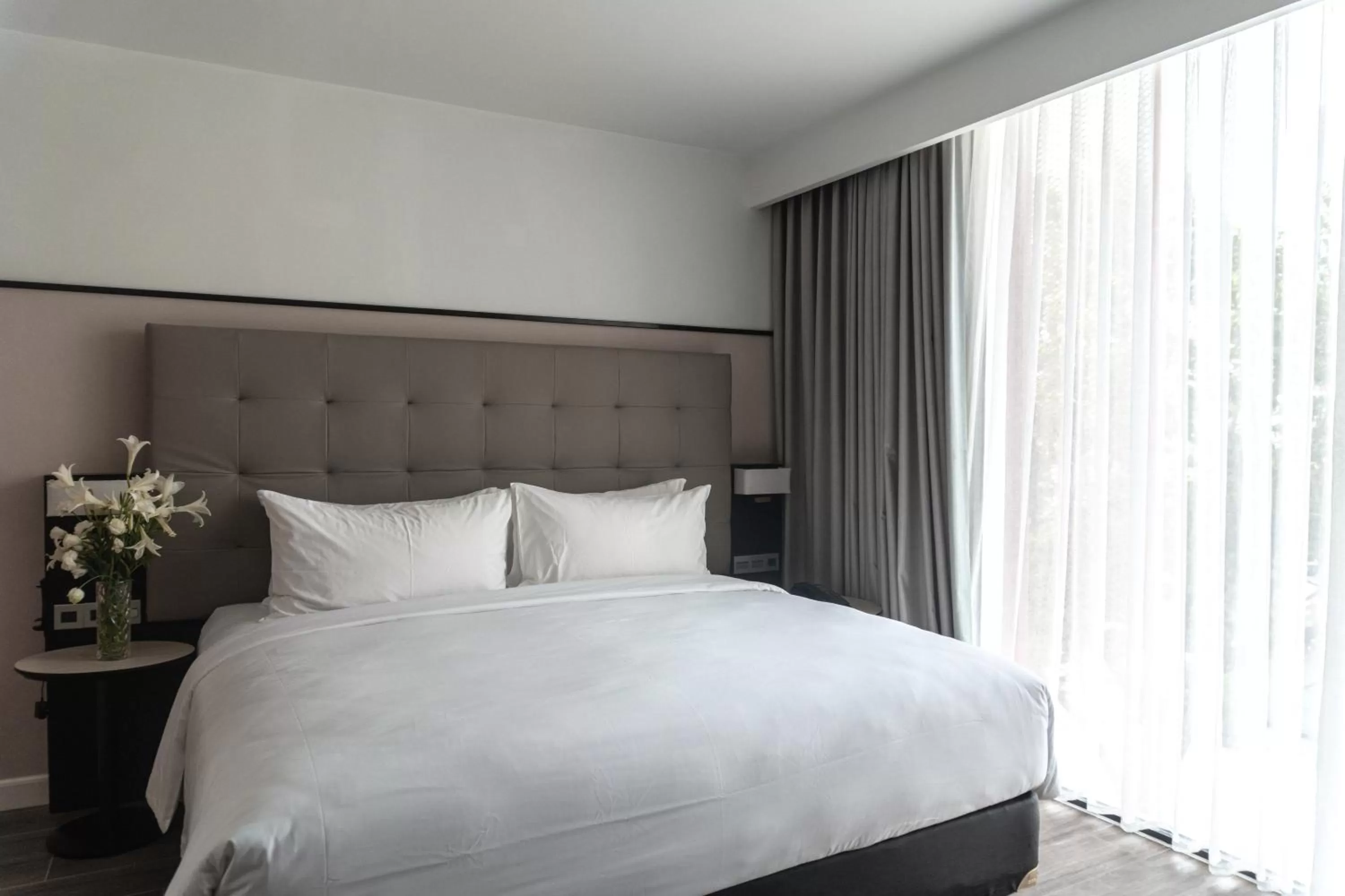 Bed in M Village Hotel Tôn Thất Đạm