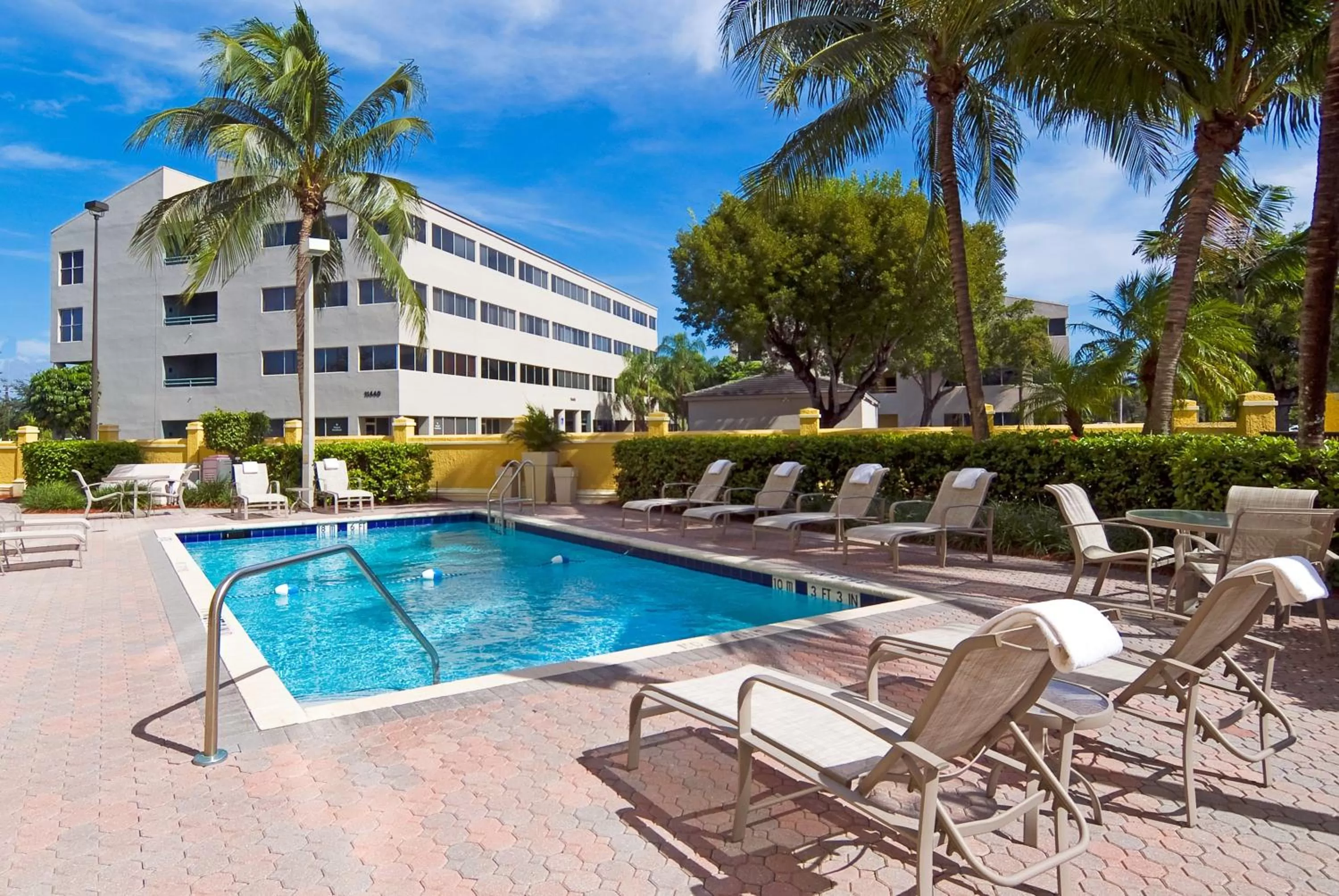 Swimming pool in Holiday Inn Express Hotel & Suites Kendall East-Miami by IHG