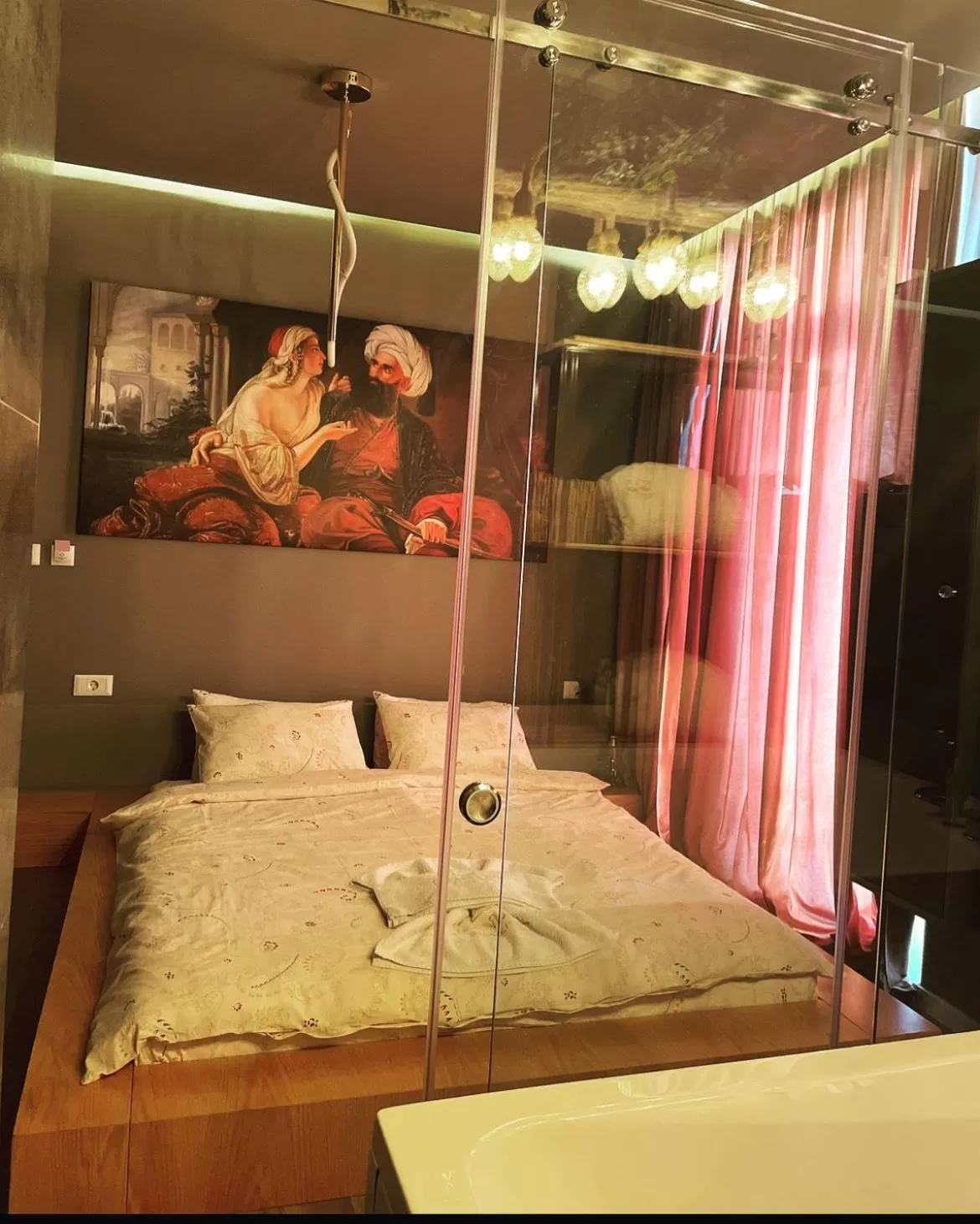 Bed in GRAND JNK Boutique Hotel