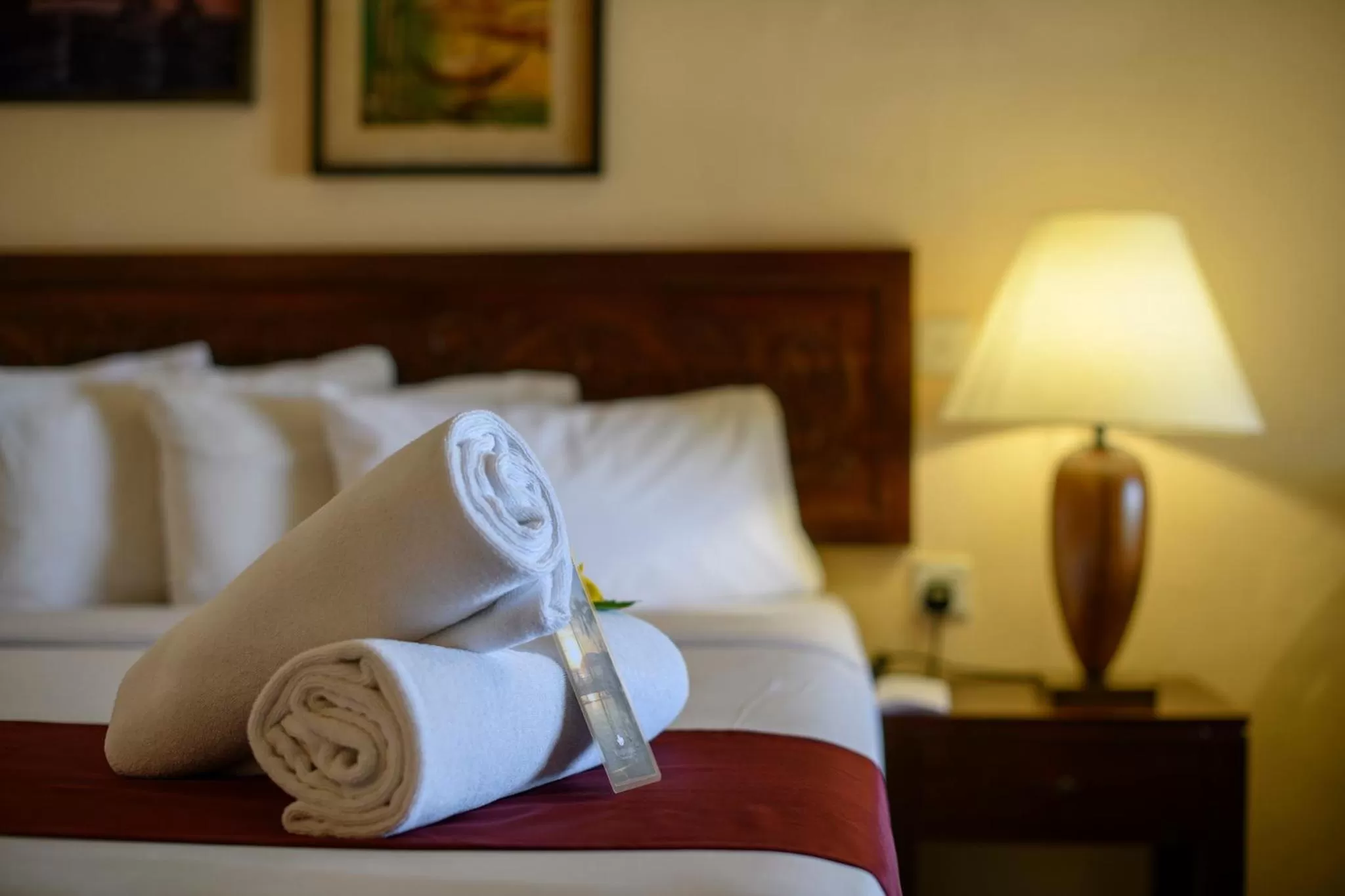 Bed in Frangipani Langkawi Resort