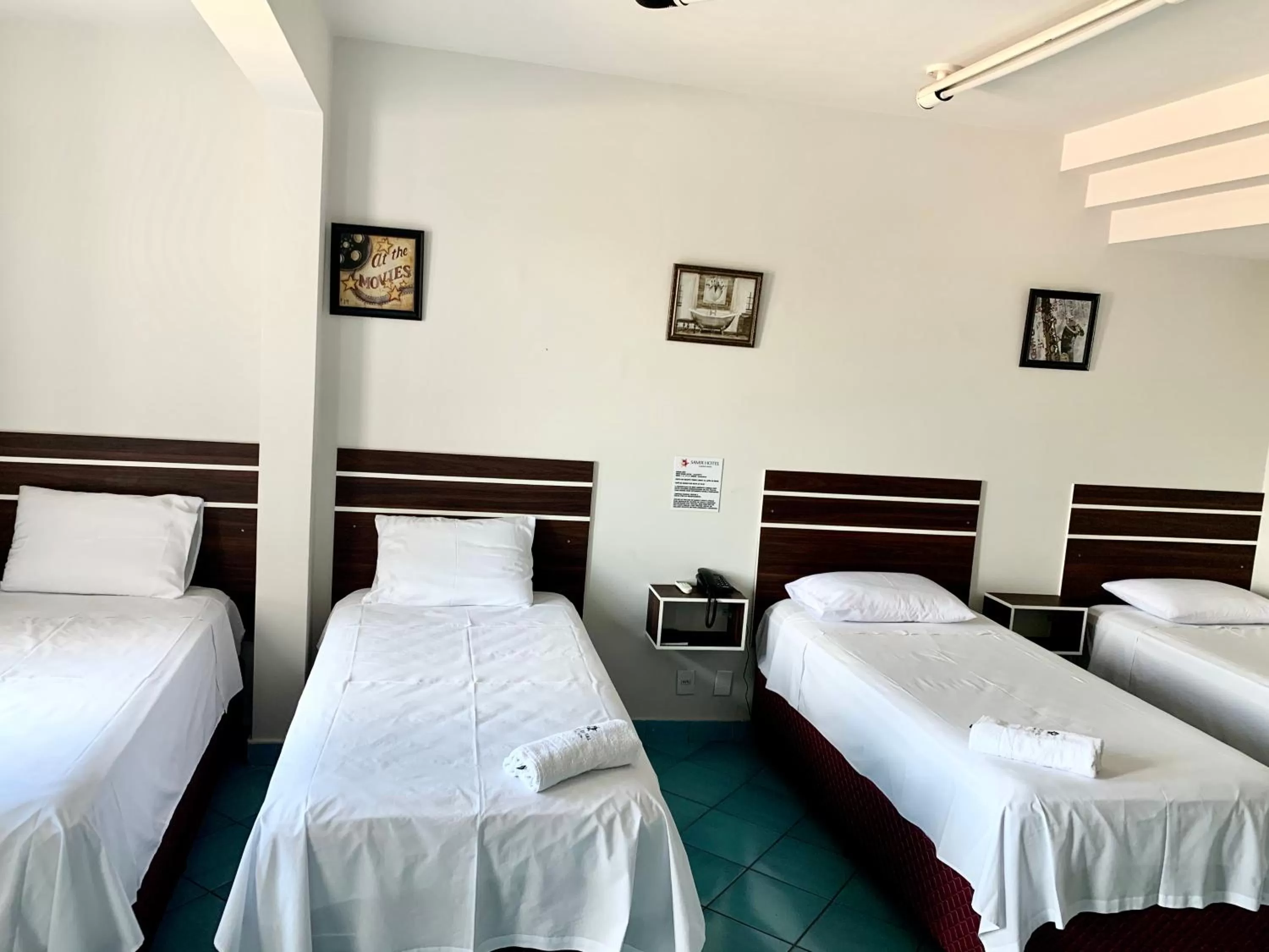 Bed in SAMIR HOTEL COMFORT