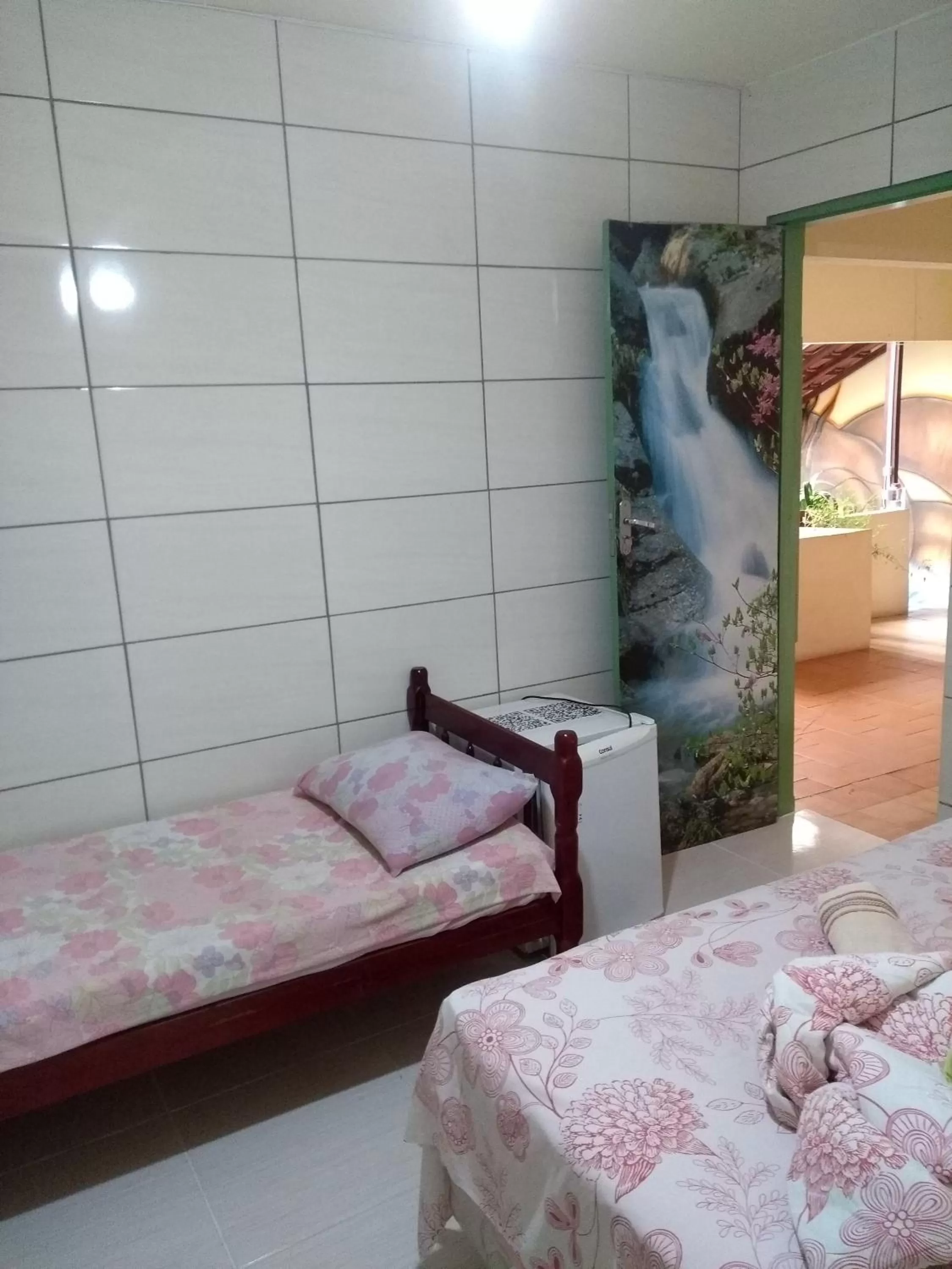 Property building, Bed in Pousada Encanto e Magia