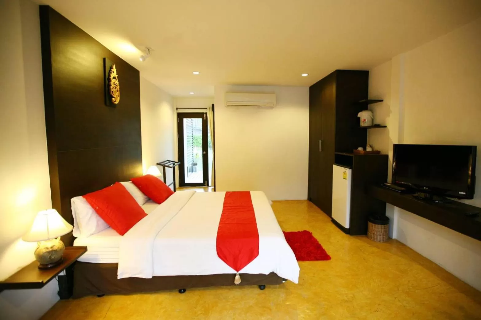 Bed, TV/Entertainment Center in Amara Resort Hua Hin