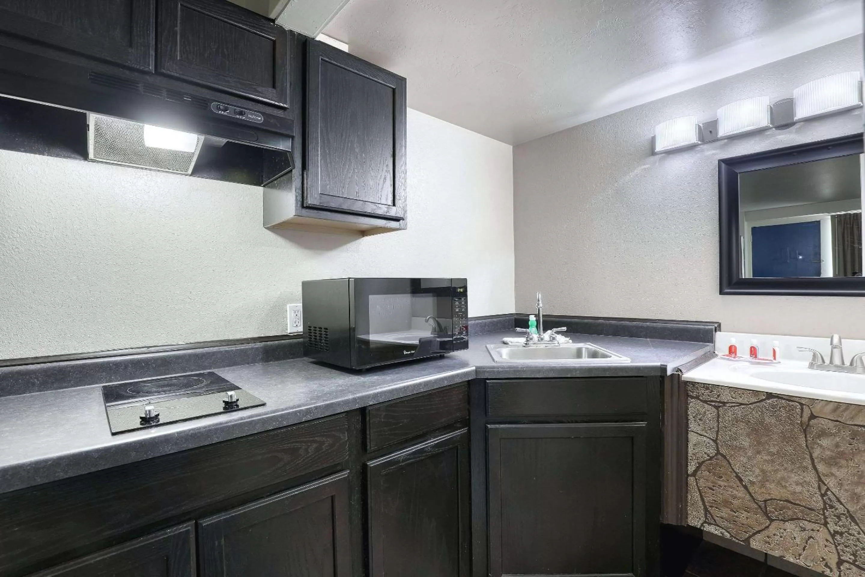 Bedroom in Suburban Studios Neenah-Appleton