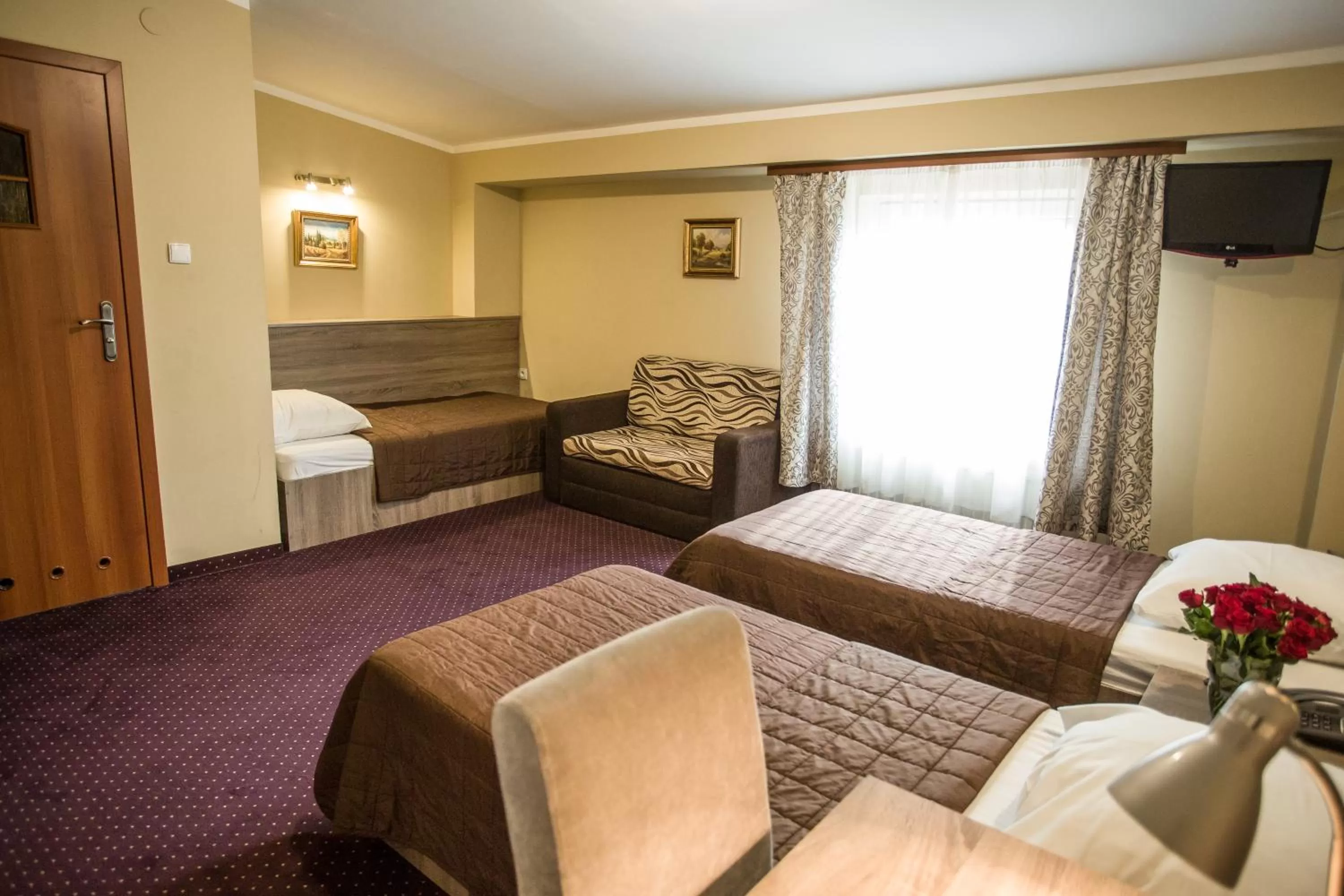 Bed in Hotel Maksymilian