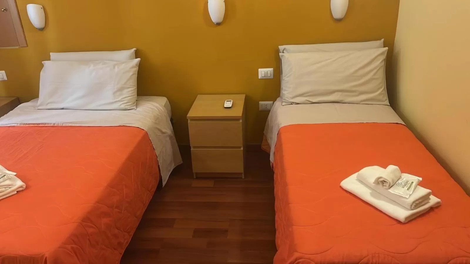 Bed in AmareRomaRooms