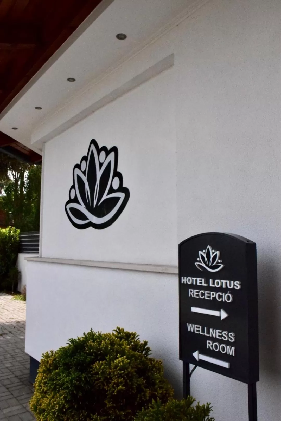 Property logo or sign in Hotel Lotus