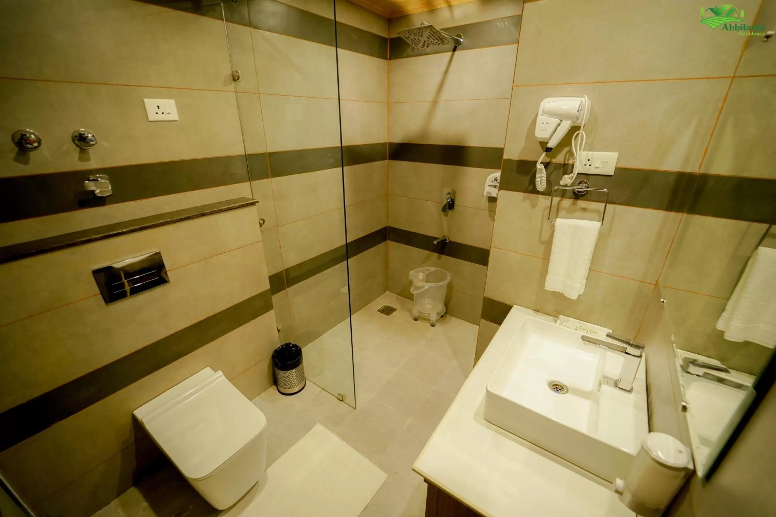 Bathroom in Abhilashi Residency & Spa - Centrally Heated & Air Cooled