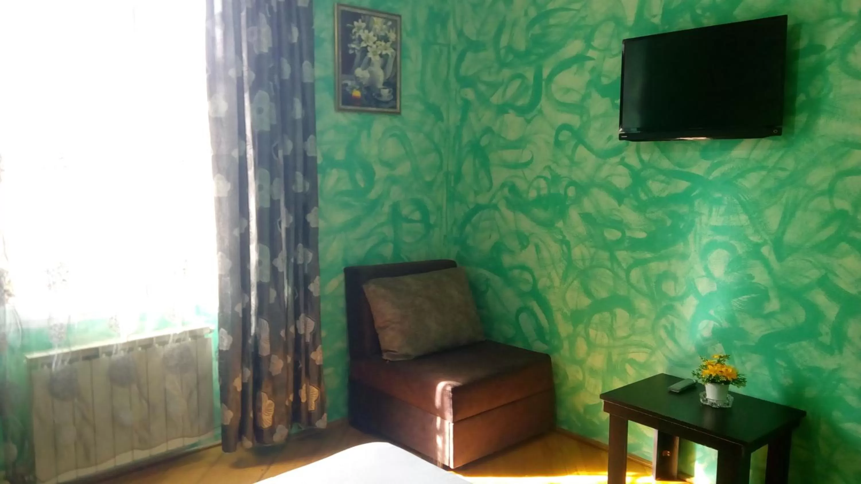 TV and multimedia, TV/Entertainment Center in Hotel Isani