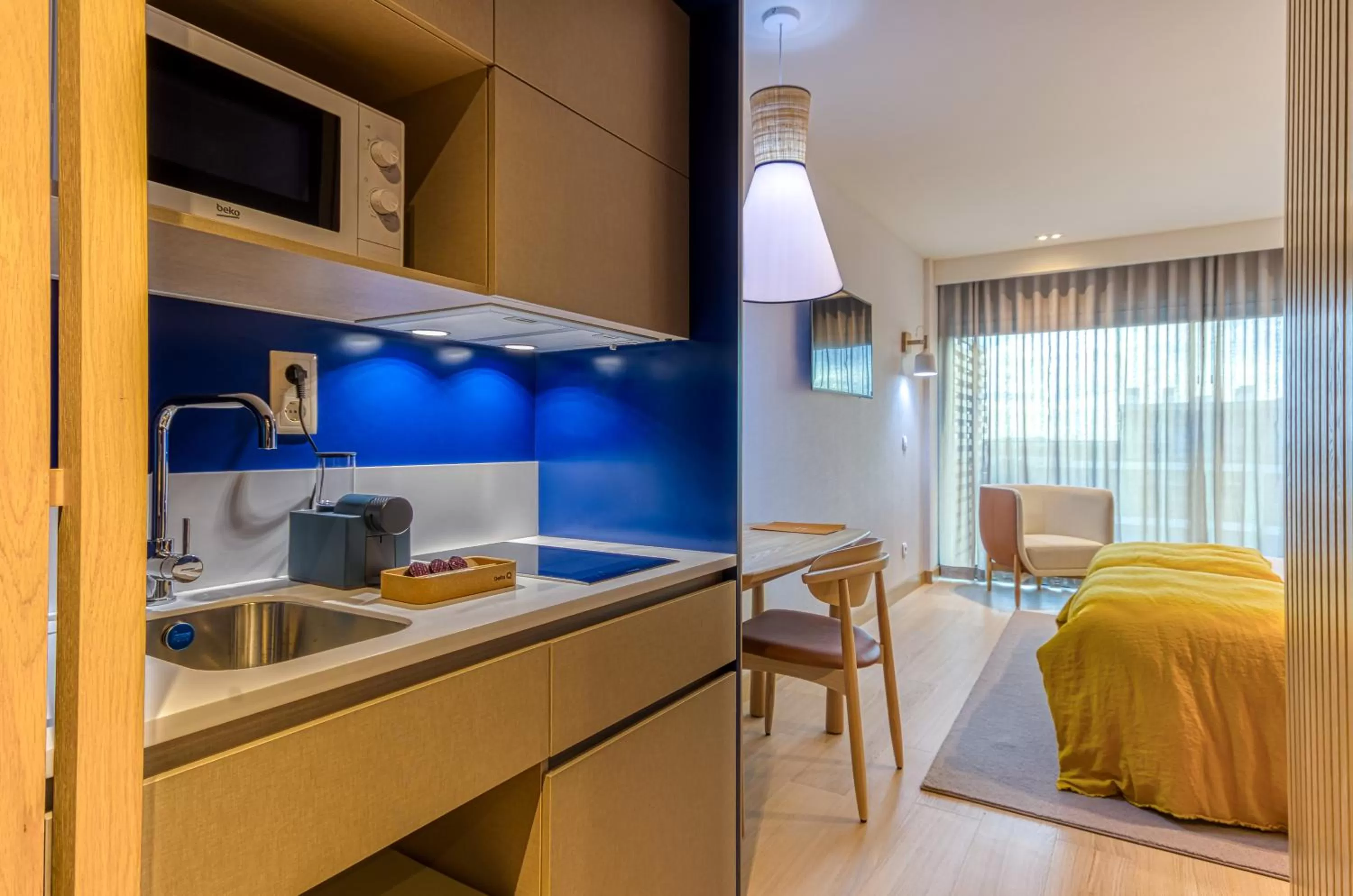 Kitchen or kitchenette, Bed in Praia do Sal Resort and SPA