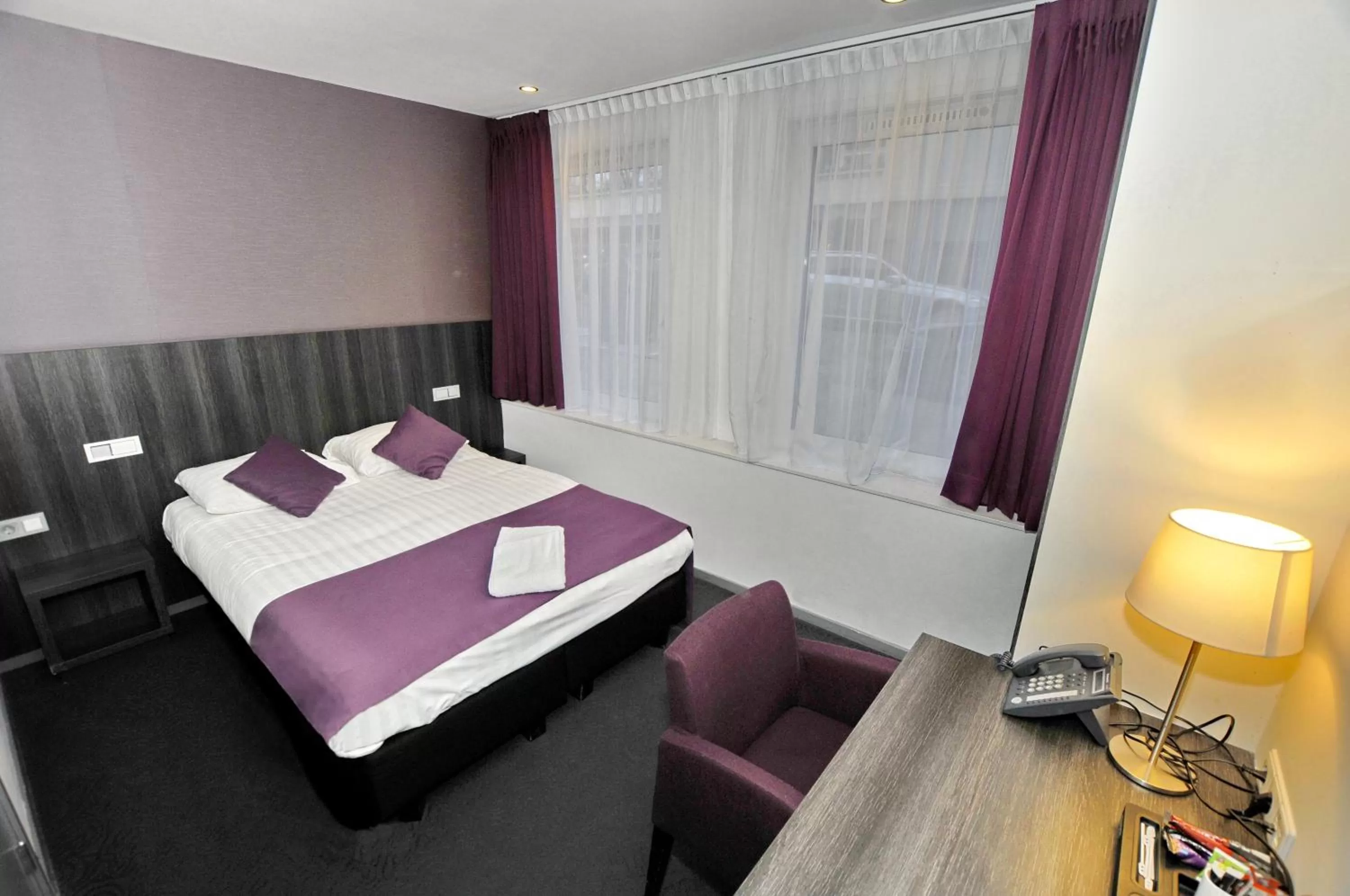 Bed in Hotel Parkview