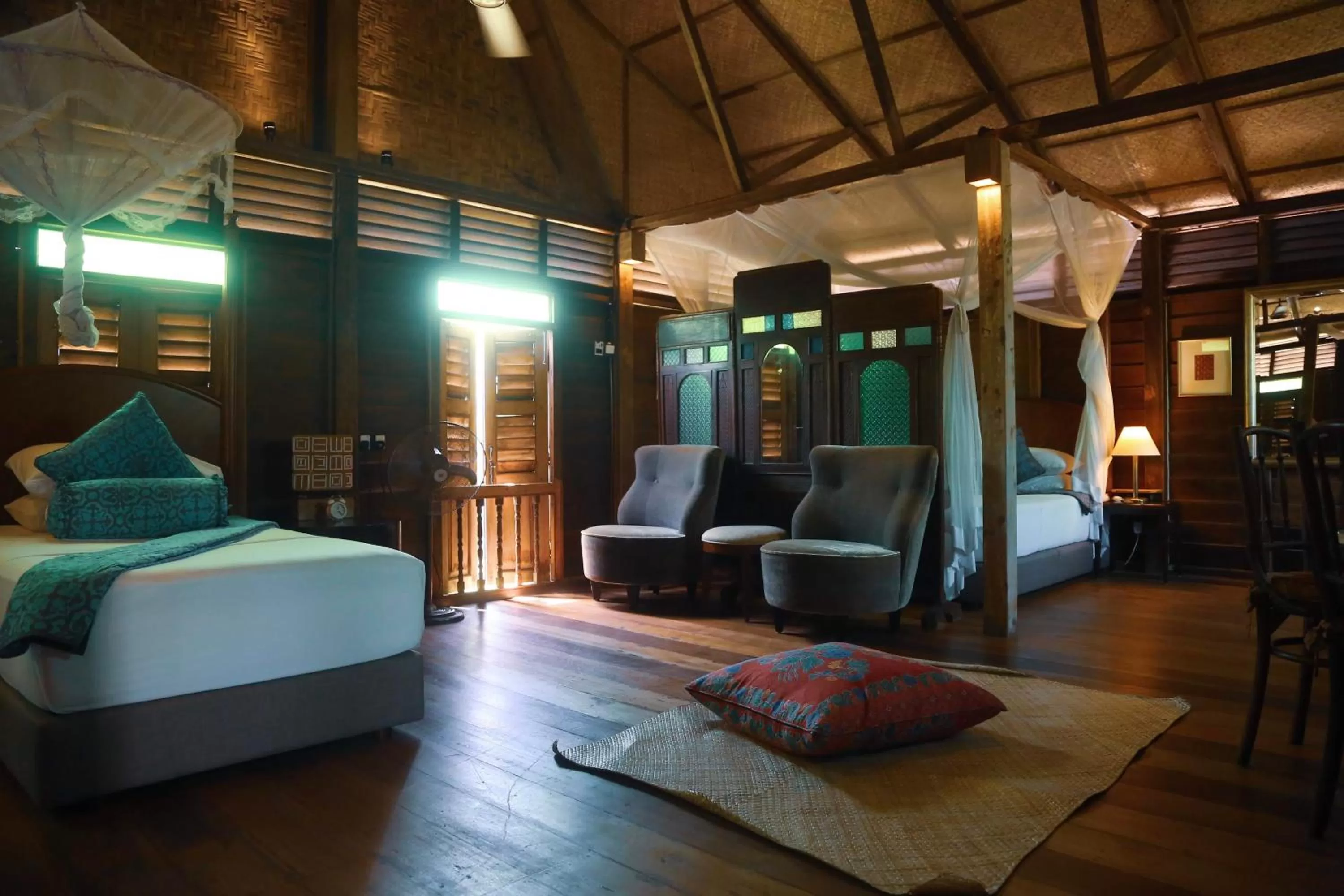 Bed in Kunang Kunang Heritage Villas