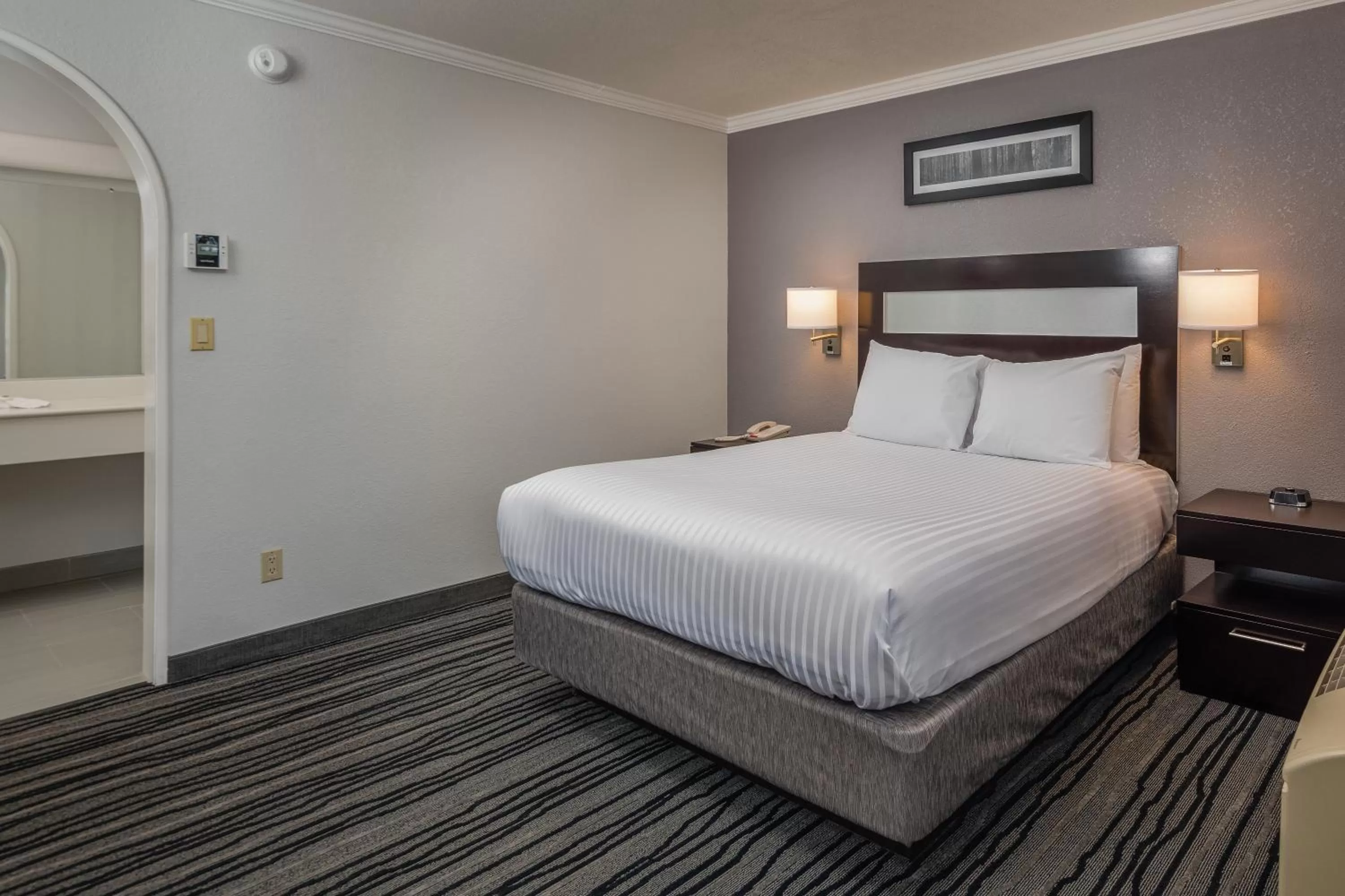 Bed in Redwood Creek Inn