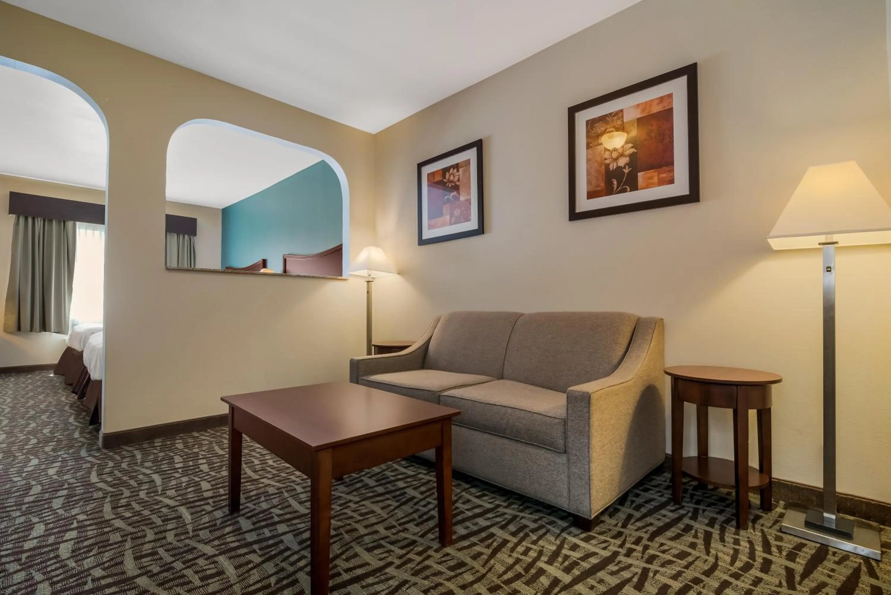 Living room in SureStay Plus Hotel by Best Western Topeka