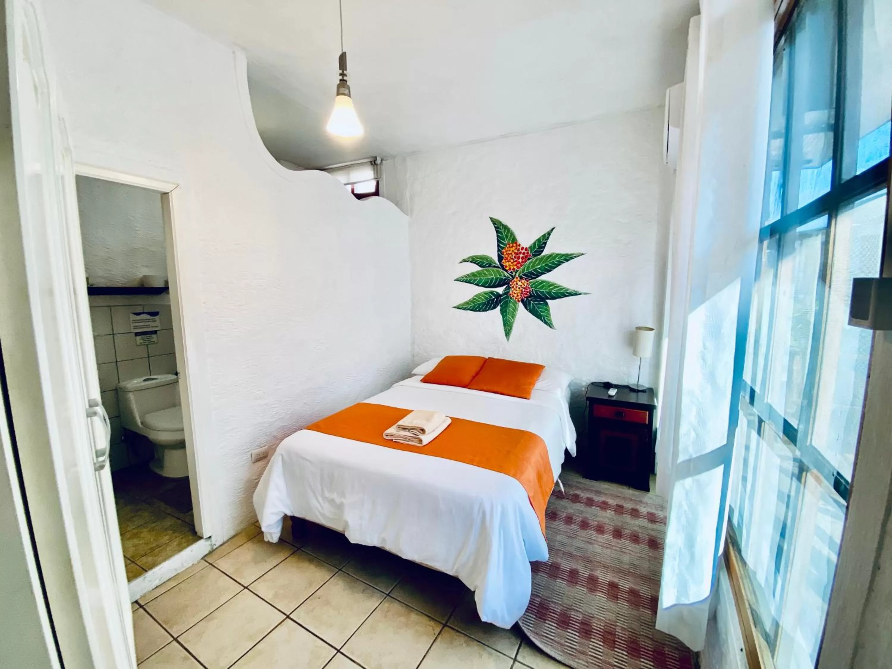 Bed in Hotel Miconia