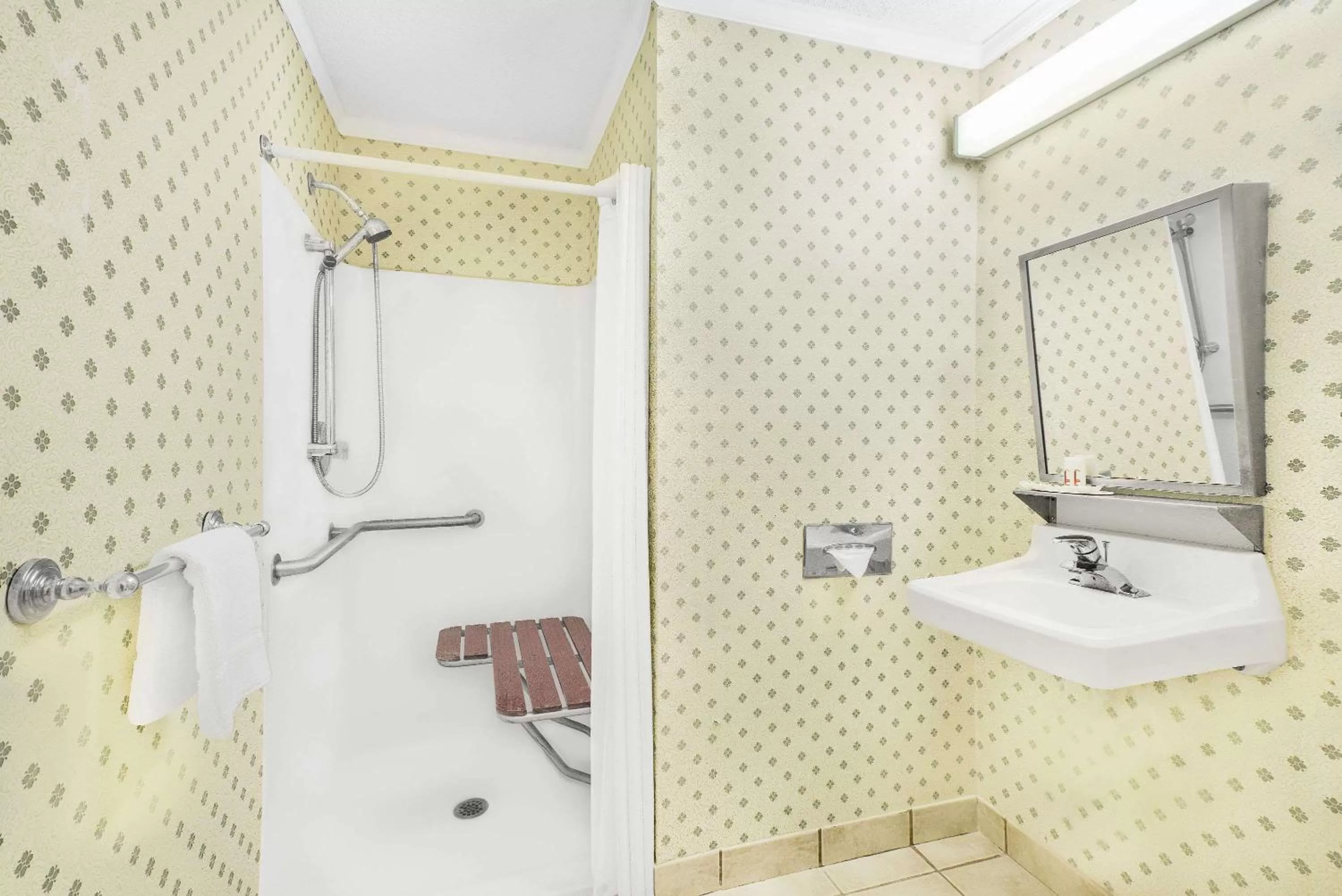 Bathroom in Super 8 by Wyndham Maumee Perrysburg Toledo Area