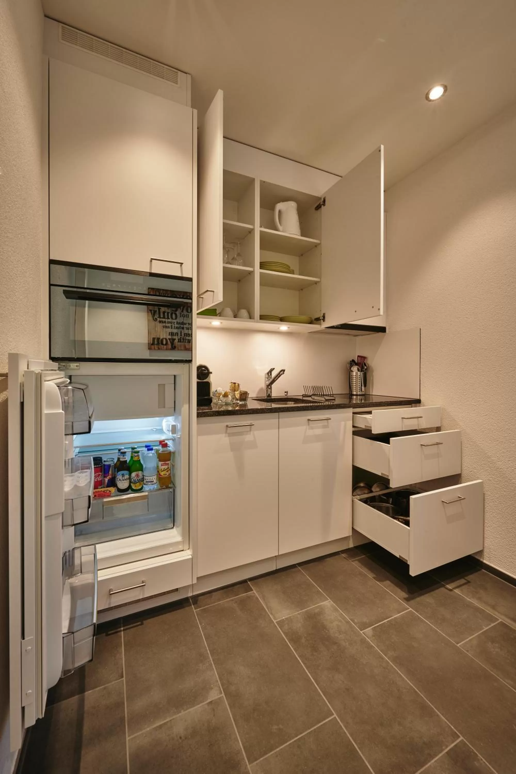 Kitchen or kitchenette in da Maurizio Suites