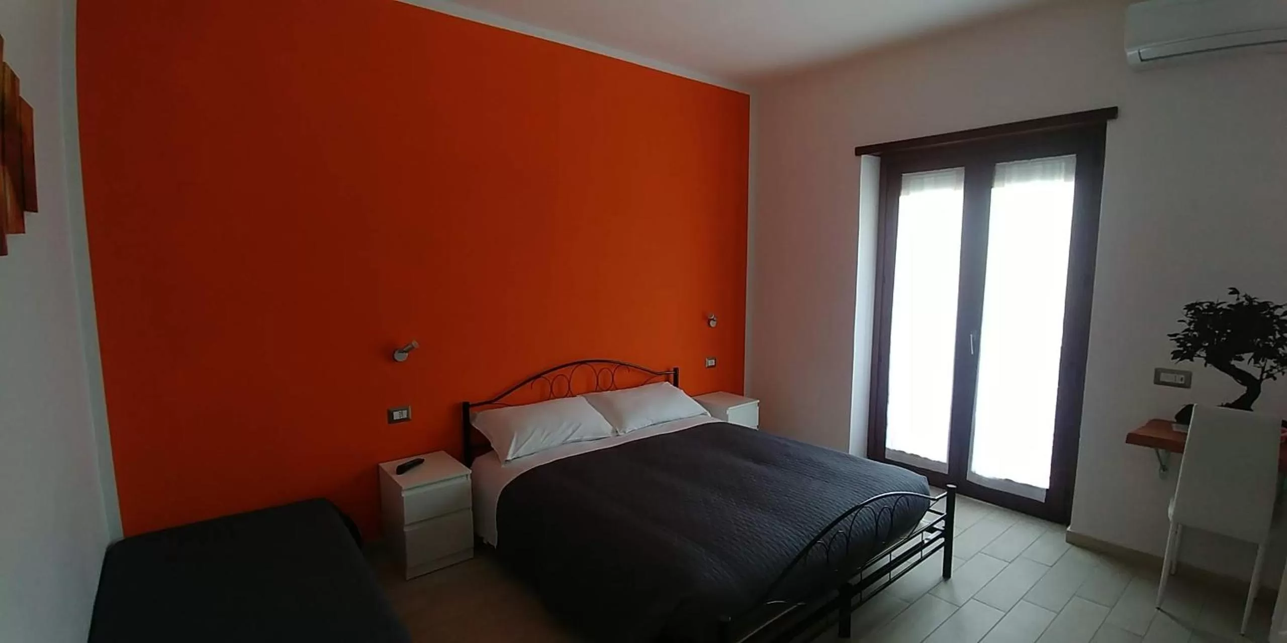 Bed in Bonsai Bed & Breakfast