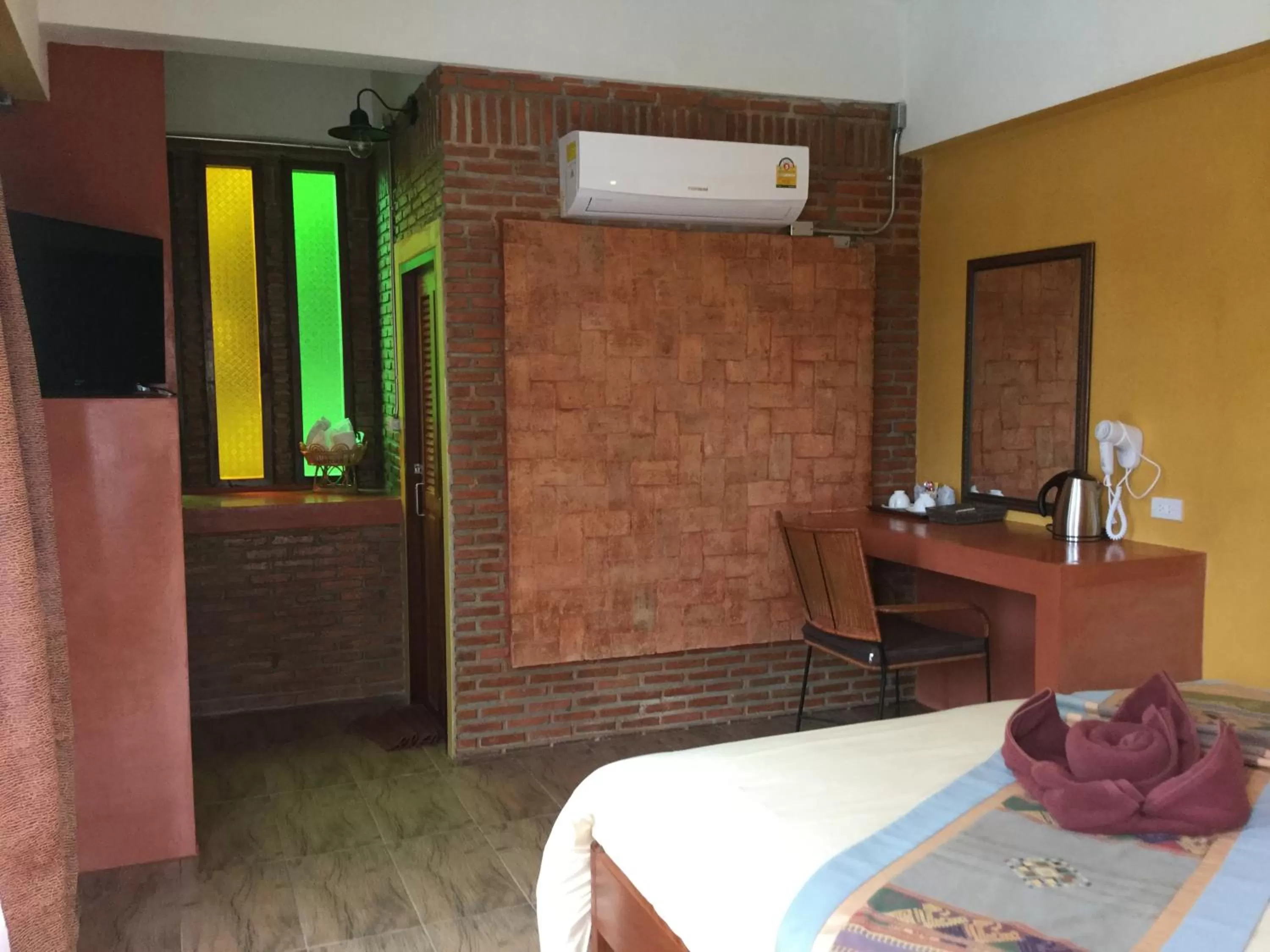 Decorative detail, Bed in Pongphen Guesthouse - SHA Plus Certified