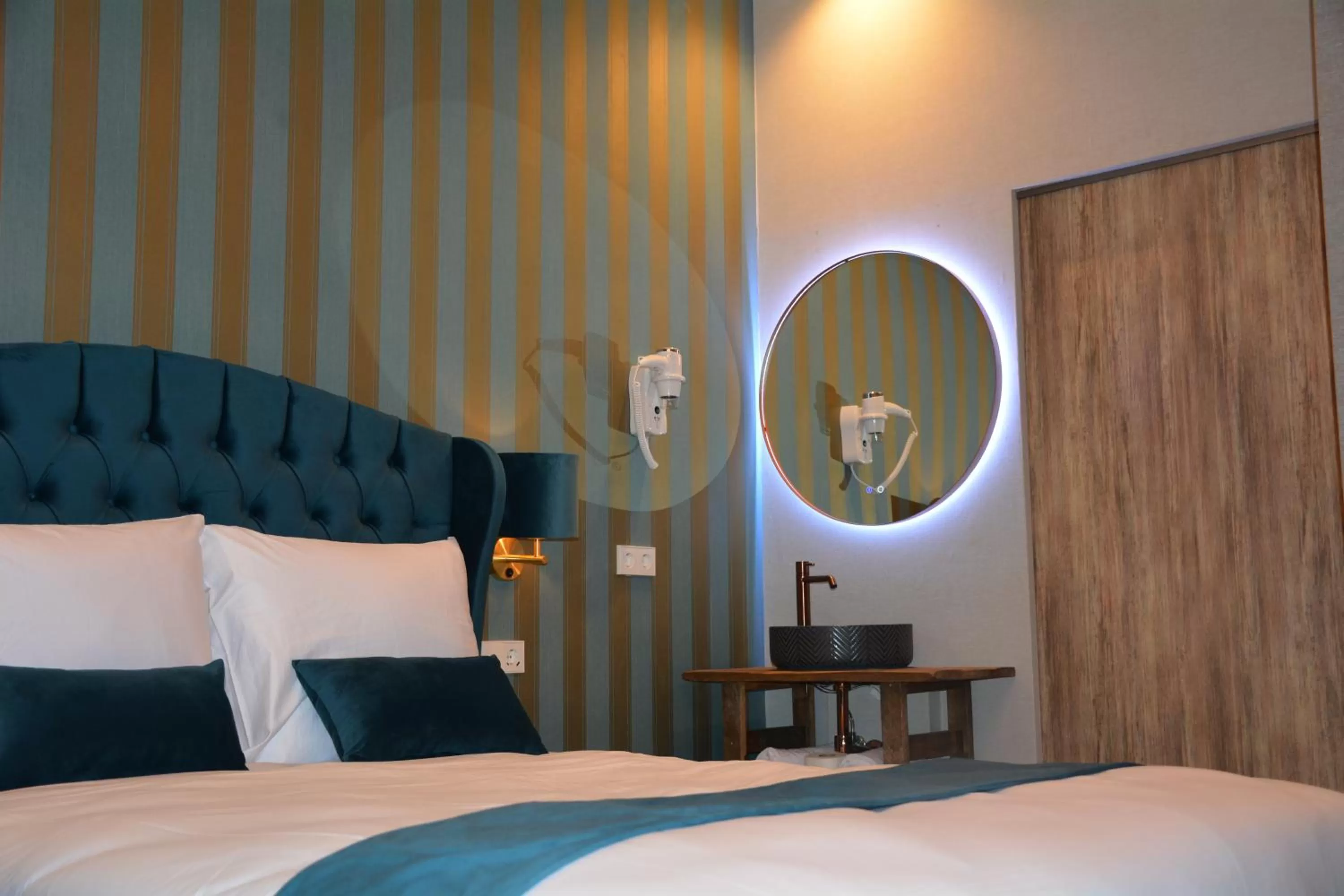 Bed in The IF Boutique hotel