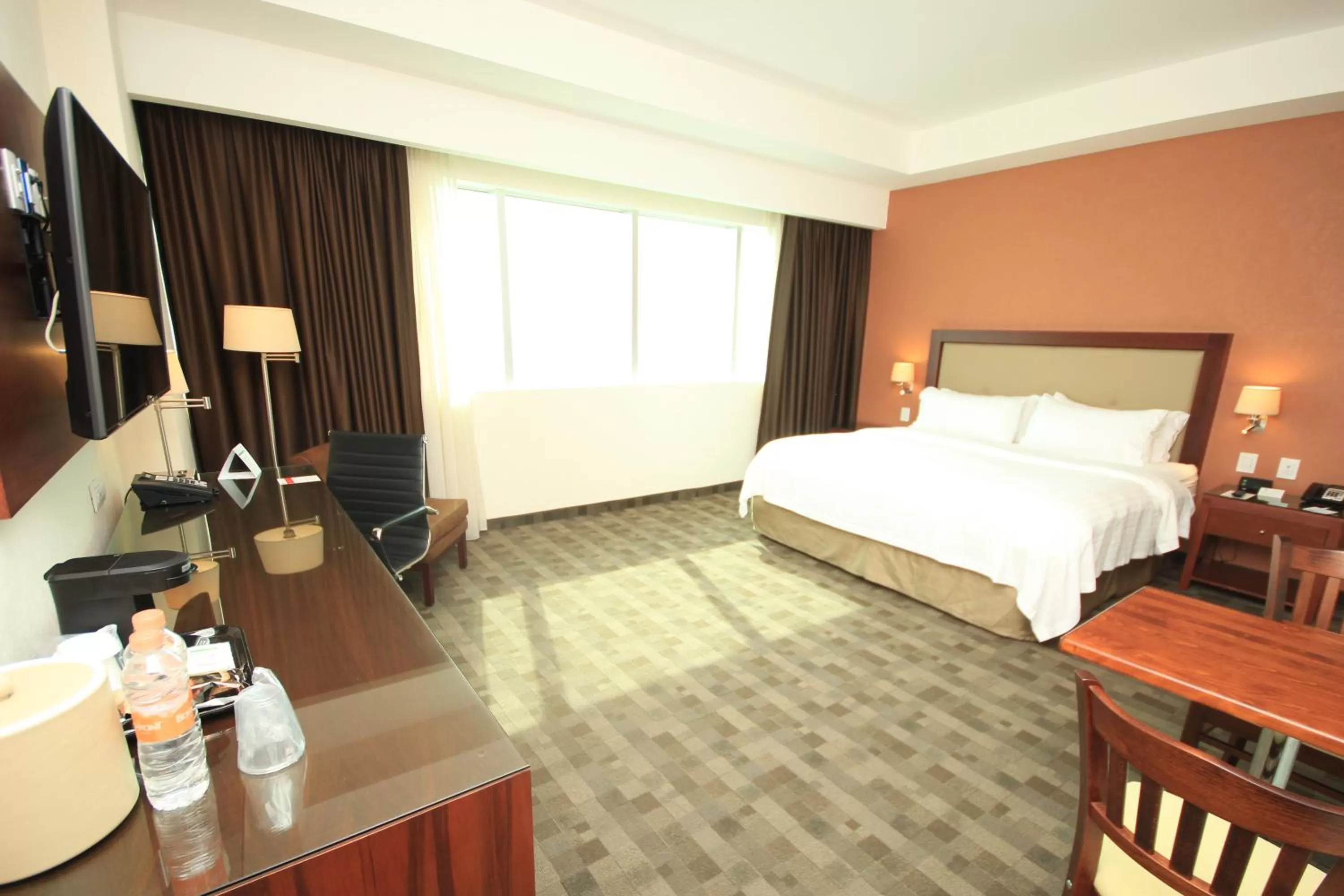 Photo of the whole room, Bed in Holiday Inn & Suites Plaza Mayor by IHG